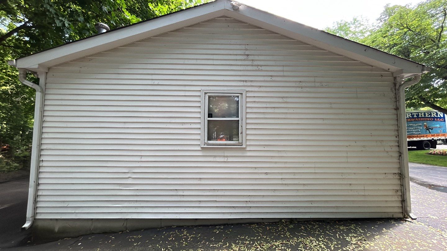 Housewashing  using Algaecide, soft wash soap by Northern Power Washing LLC.