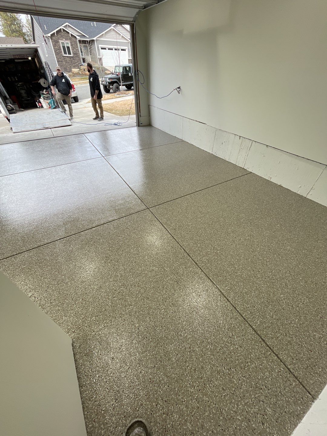 Garage Transformation using Pebble Beach by Croc Coatings, LLC