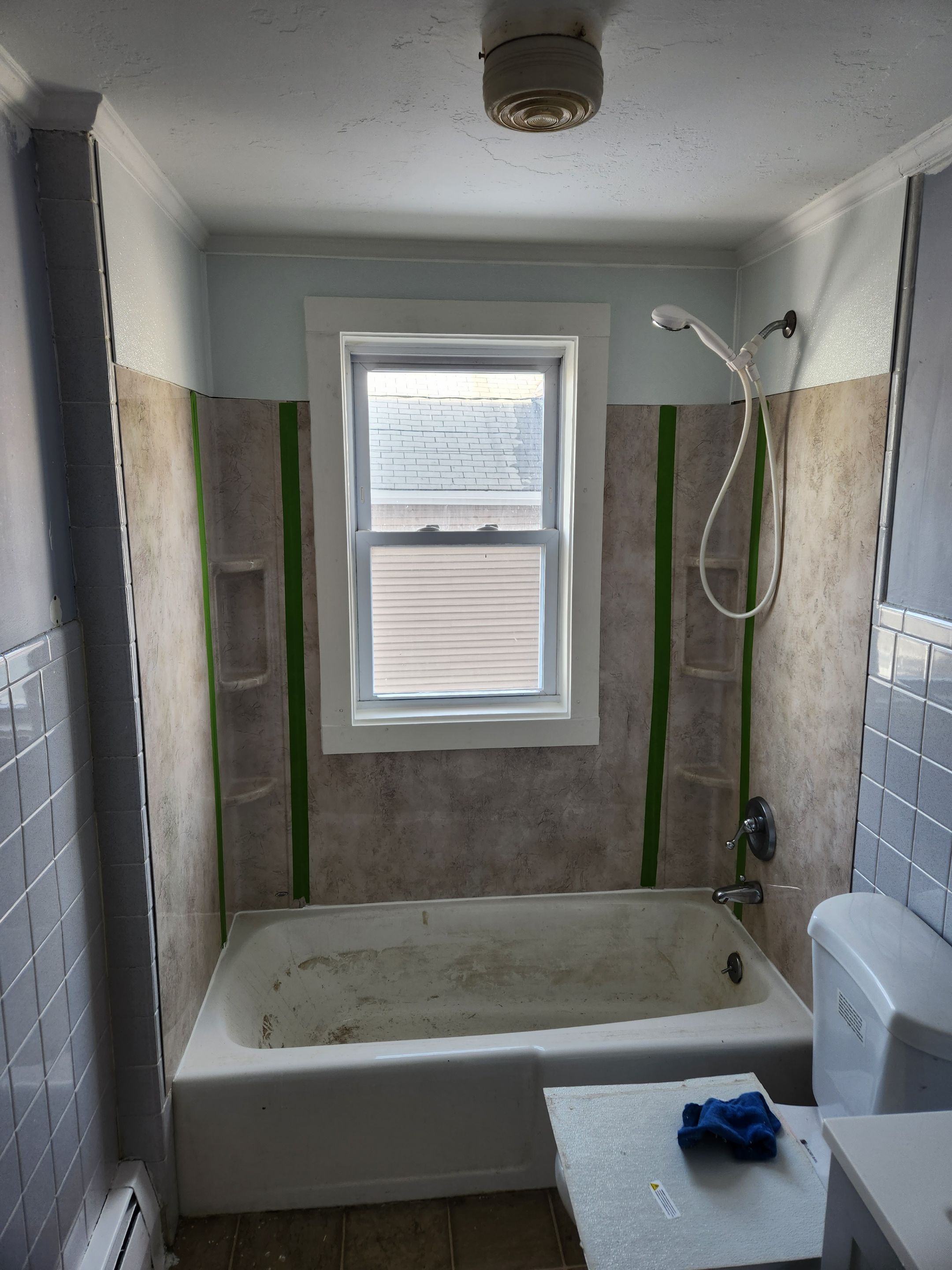 Shower wall and window trim replacement by Freedom Handyman Services