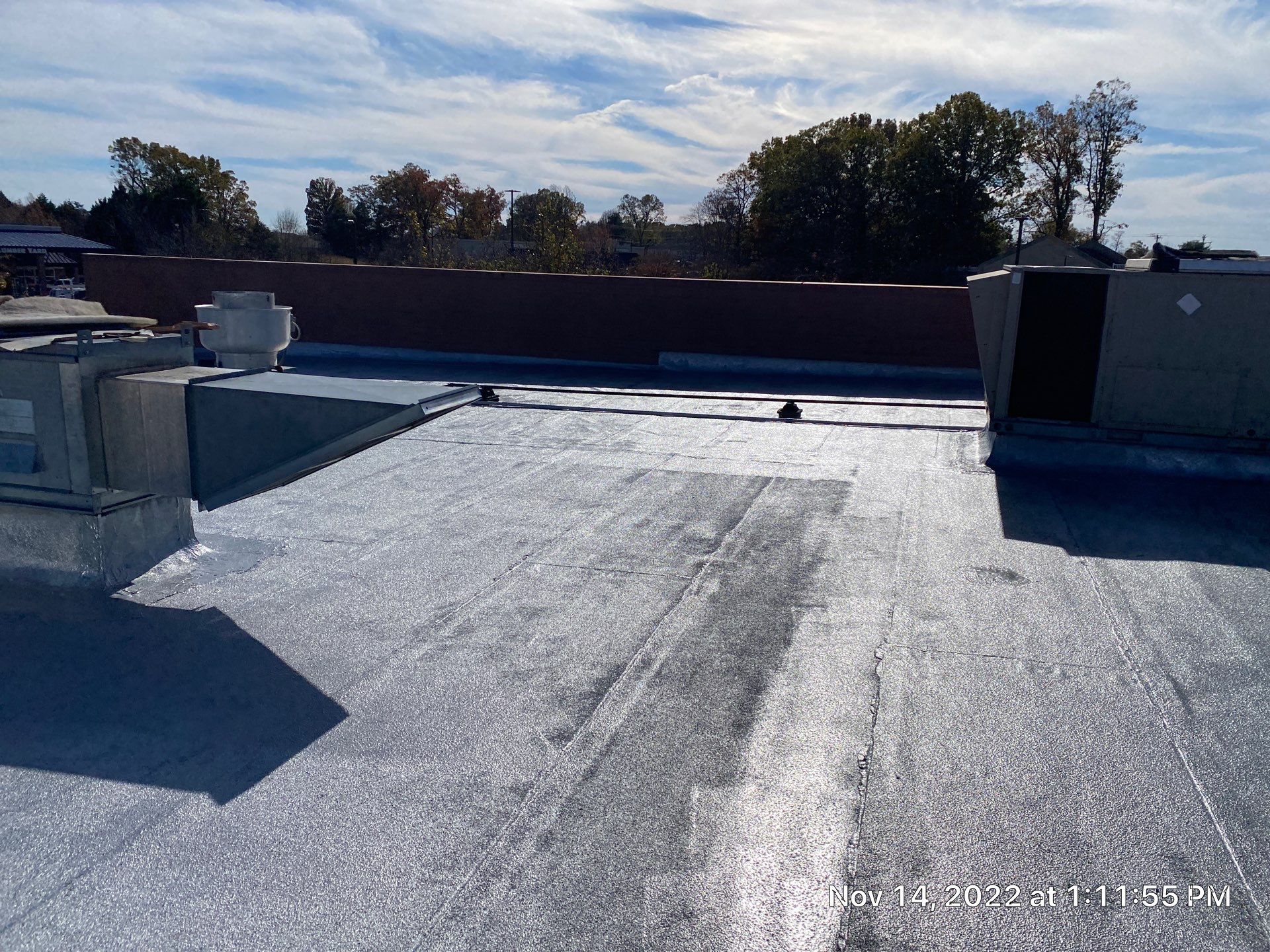 Commercial Coating using Poly Urerthane and Silicone Coating by Just In Time Roofing and Restoration
