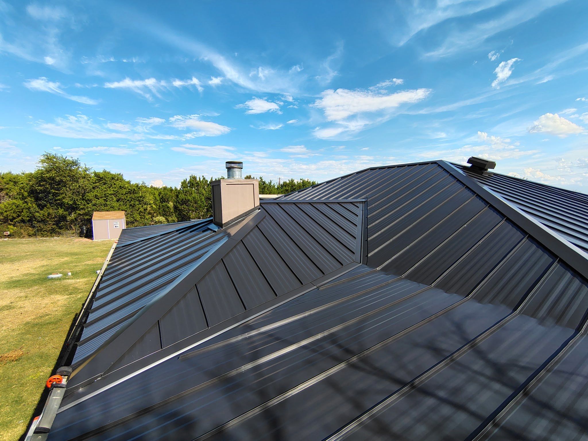 Residential Roof Replacement using 24 GA Double-Lock - Matte Black by Action Exteriors Austin