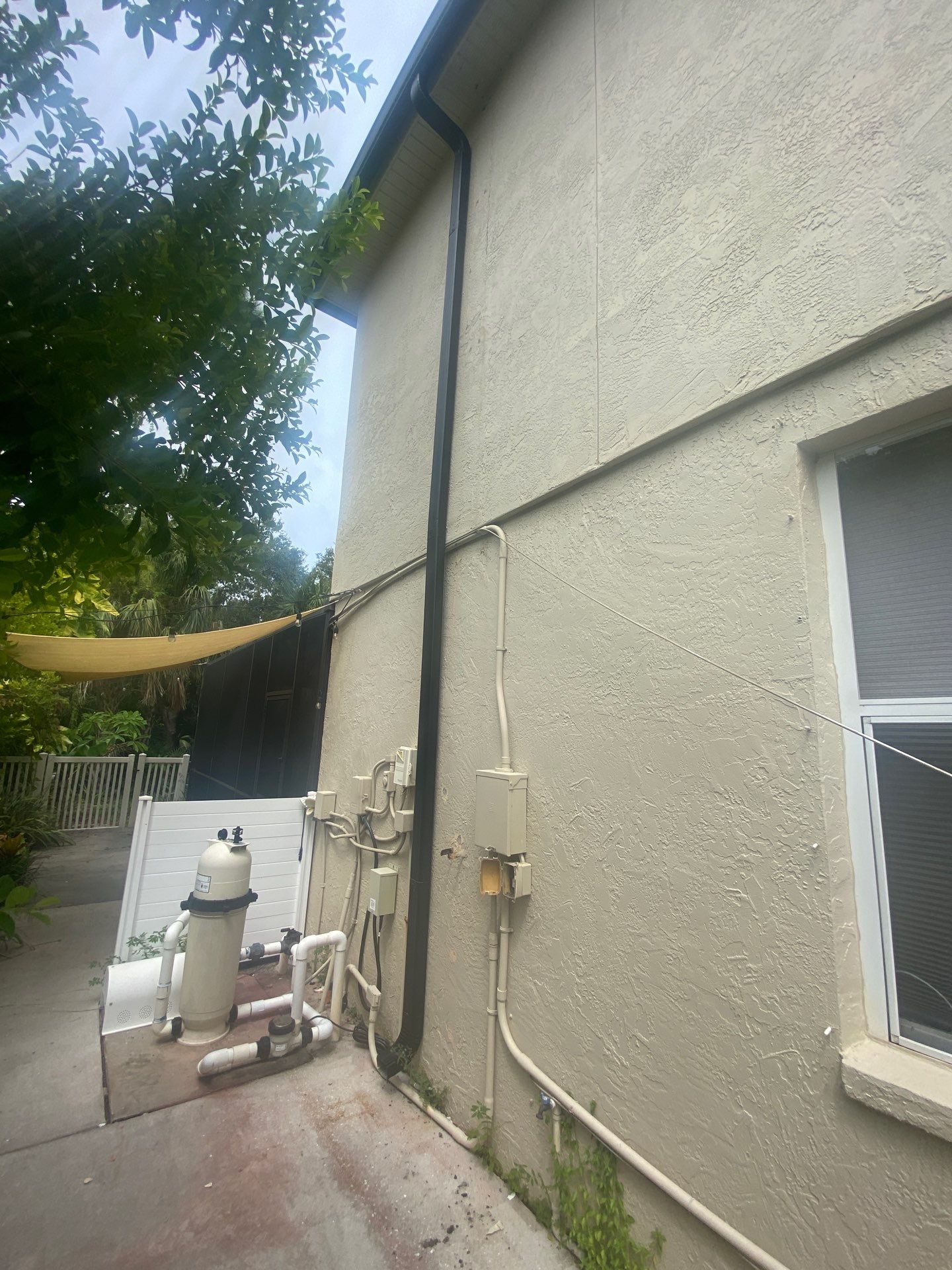 Black Seamless Gutters for Modern Homes in Osprey FL by Gutter Professors