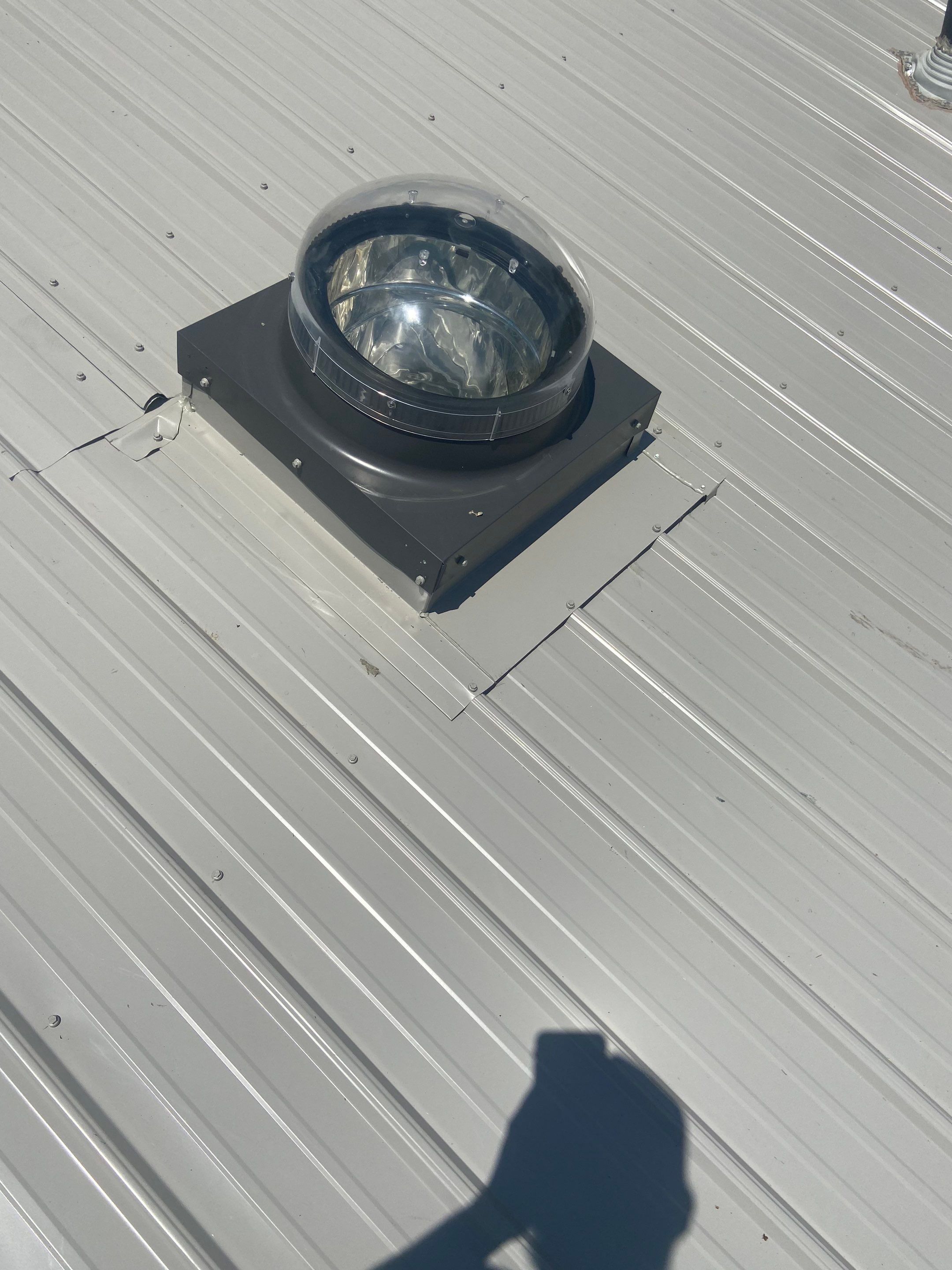 Metal Roofing, Skylights, Porch Build by Secure Construction Company Inc