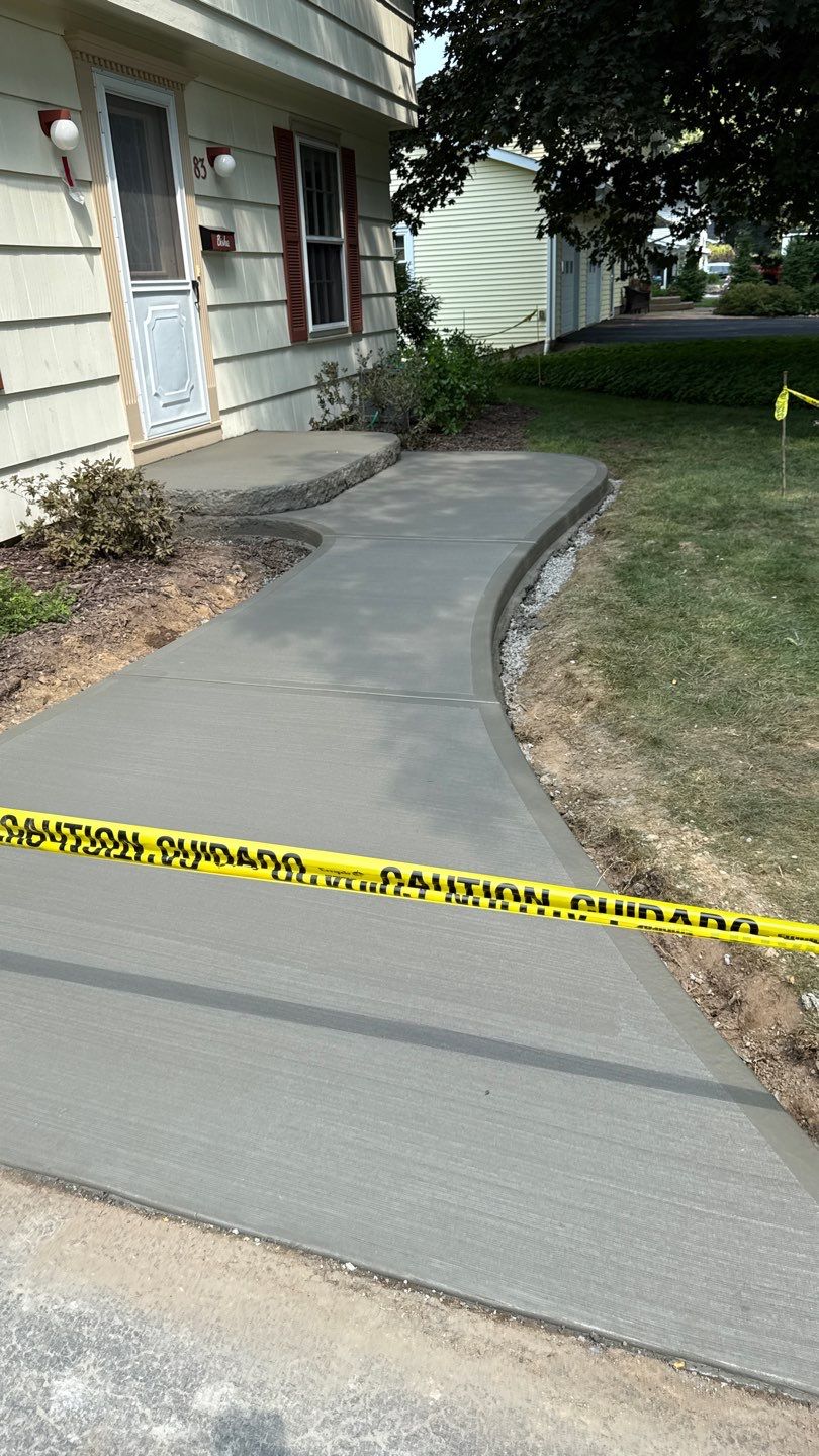 Broom Finish Walkway  by NG Masonry & Construction LLC