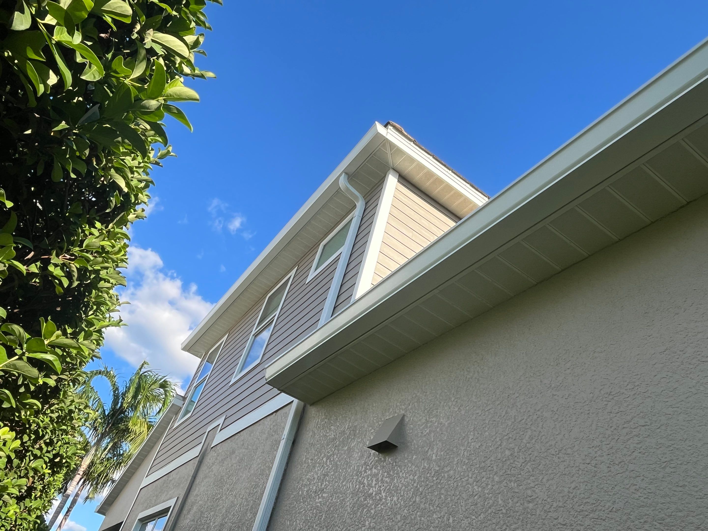 Bronze Downspouts & 7-Inch K-style Seamless Gutter Installation in Fort Myers FL by Gutter Professors