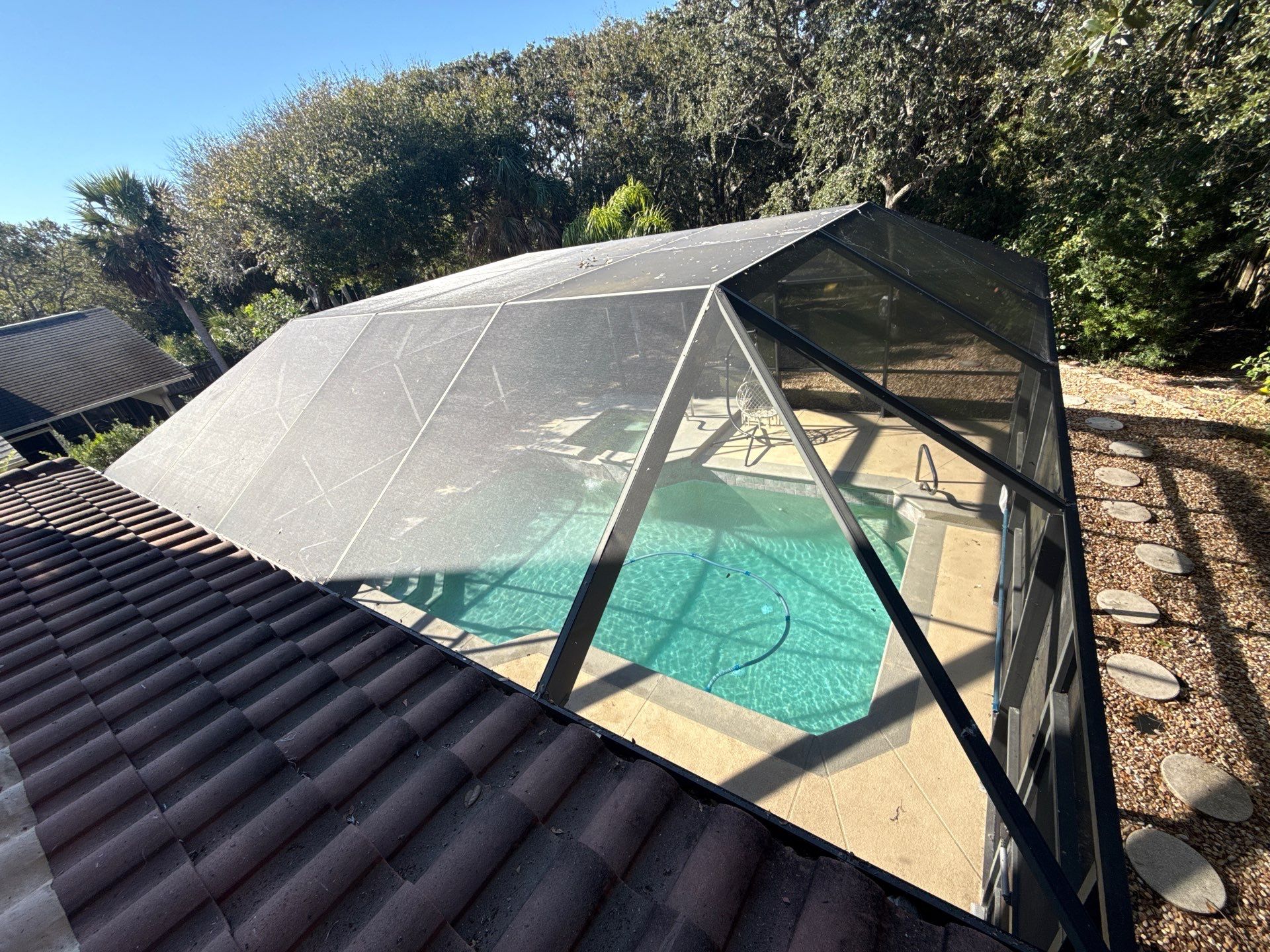 Flagler Beach Residential Tile Roof Replacement with Dark Barrel Tiles by Fortified Roofing Solutions Corp.