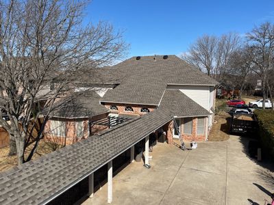 Major storm damage required full roof replacement along with other exterior repairs