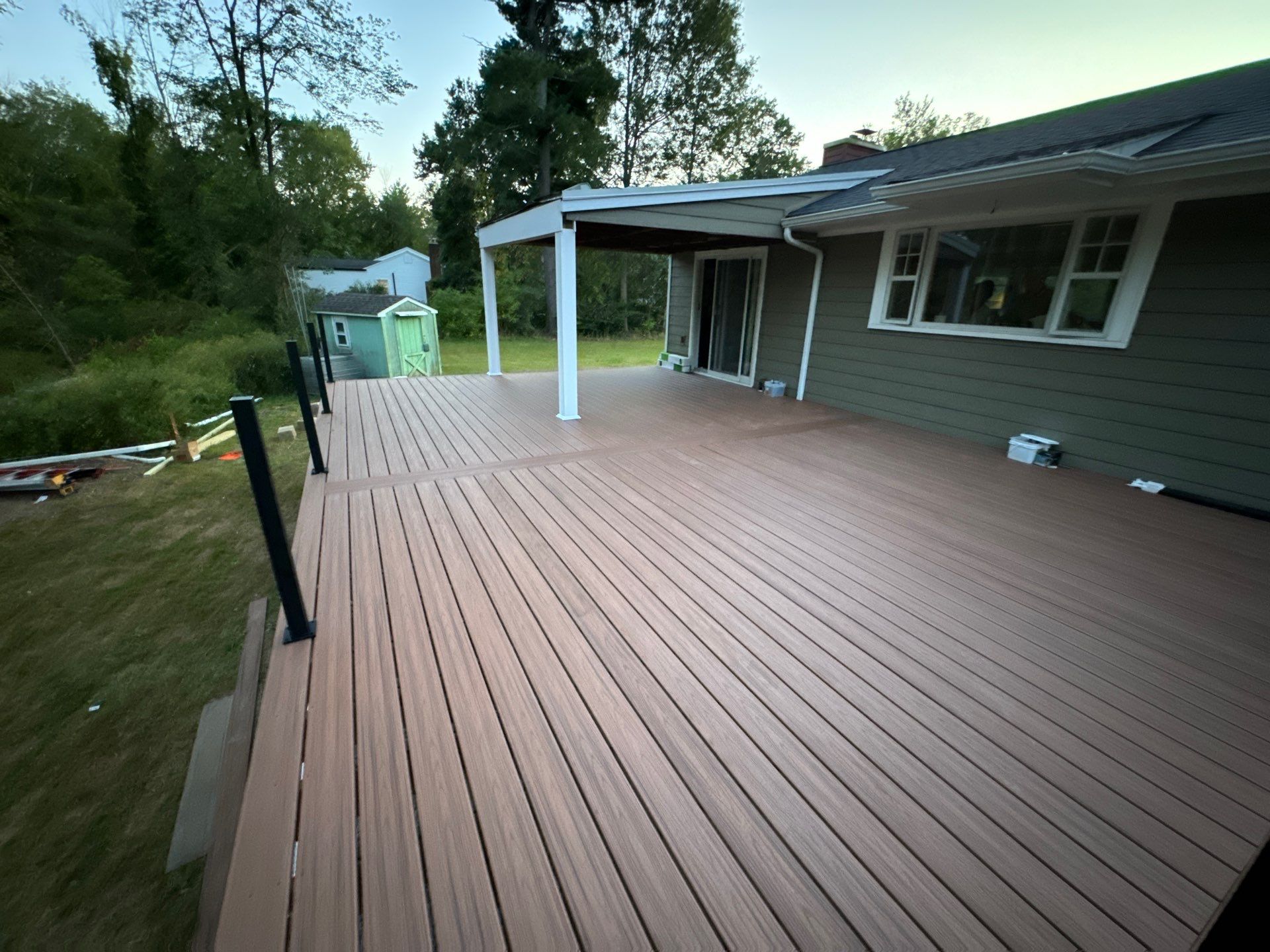 New Deck using Trex Tiki Torch  by deck guardian