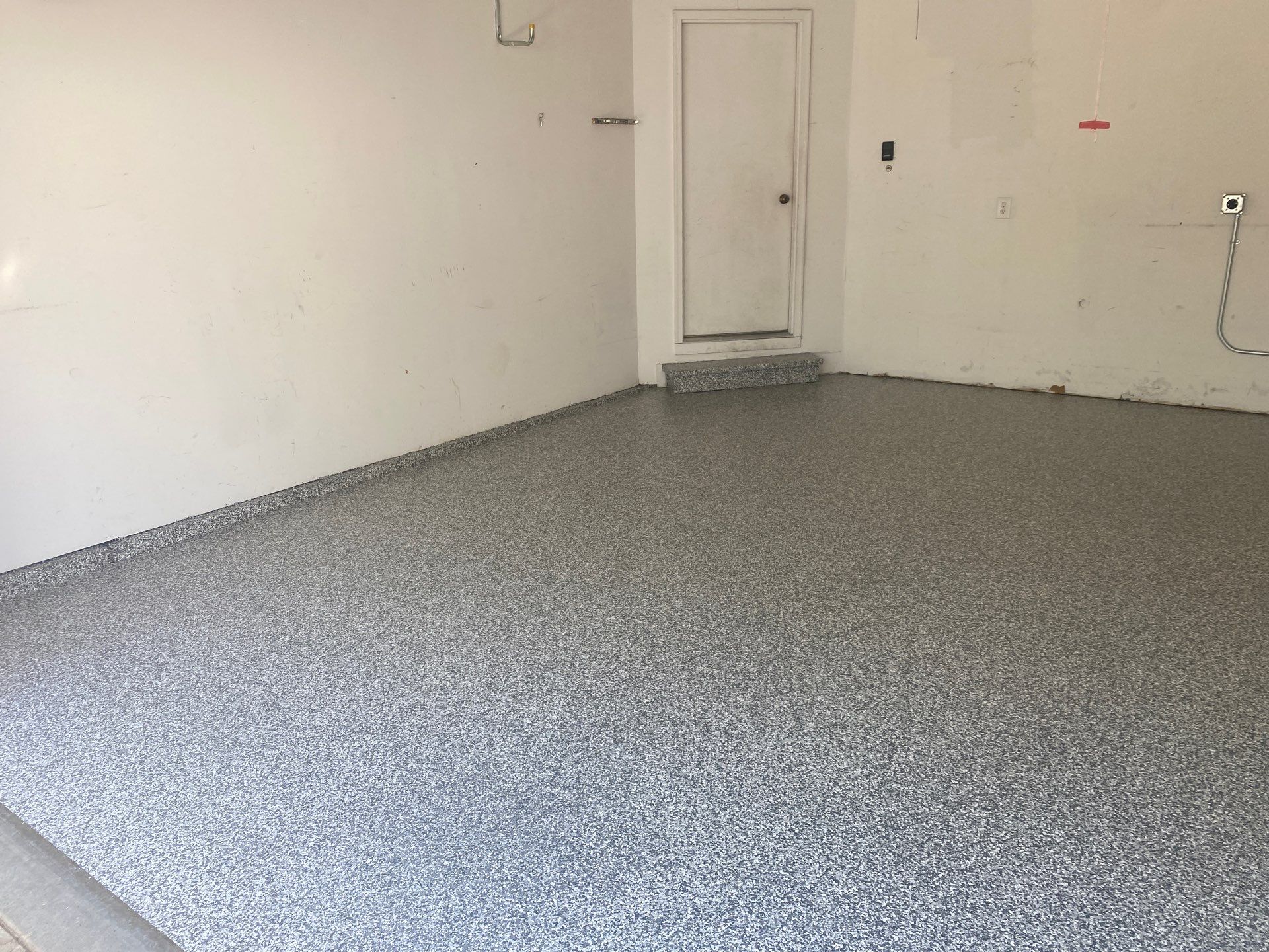 Drew D. gets a new garage floor! by Banner Garage