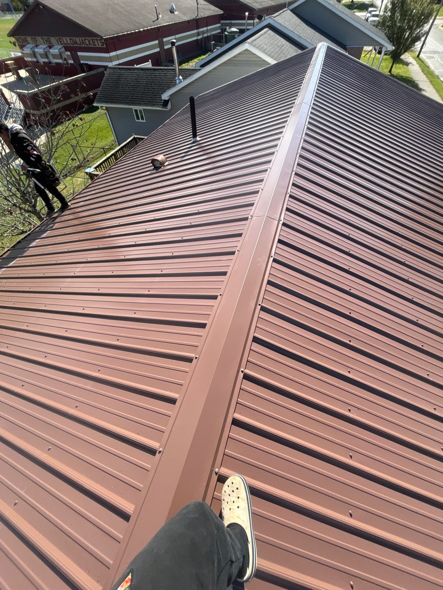 Residential Roofing Installation using Metal by Rainstoppers Roofing