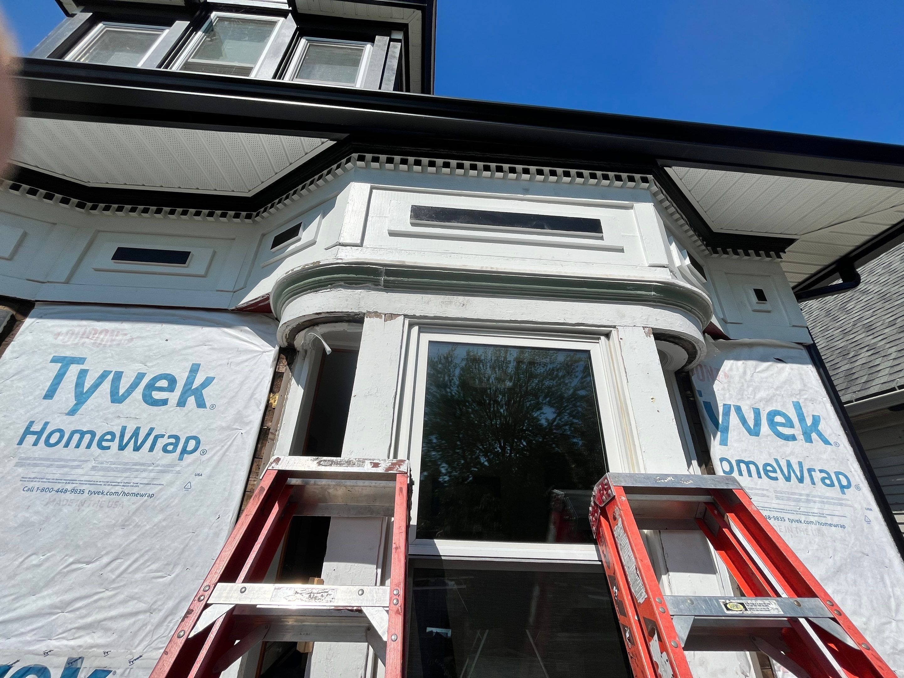 Exterior Renovations- Siding, Stamped Concrete, Porch, and Railings by Ivy Lea Construction