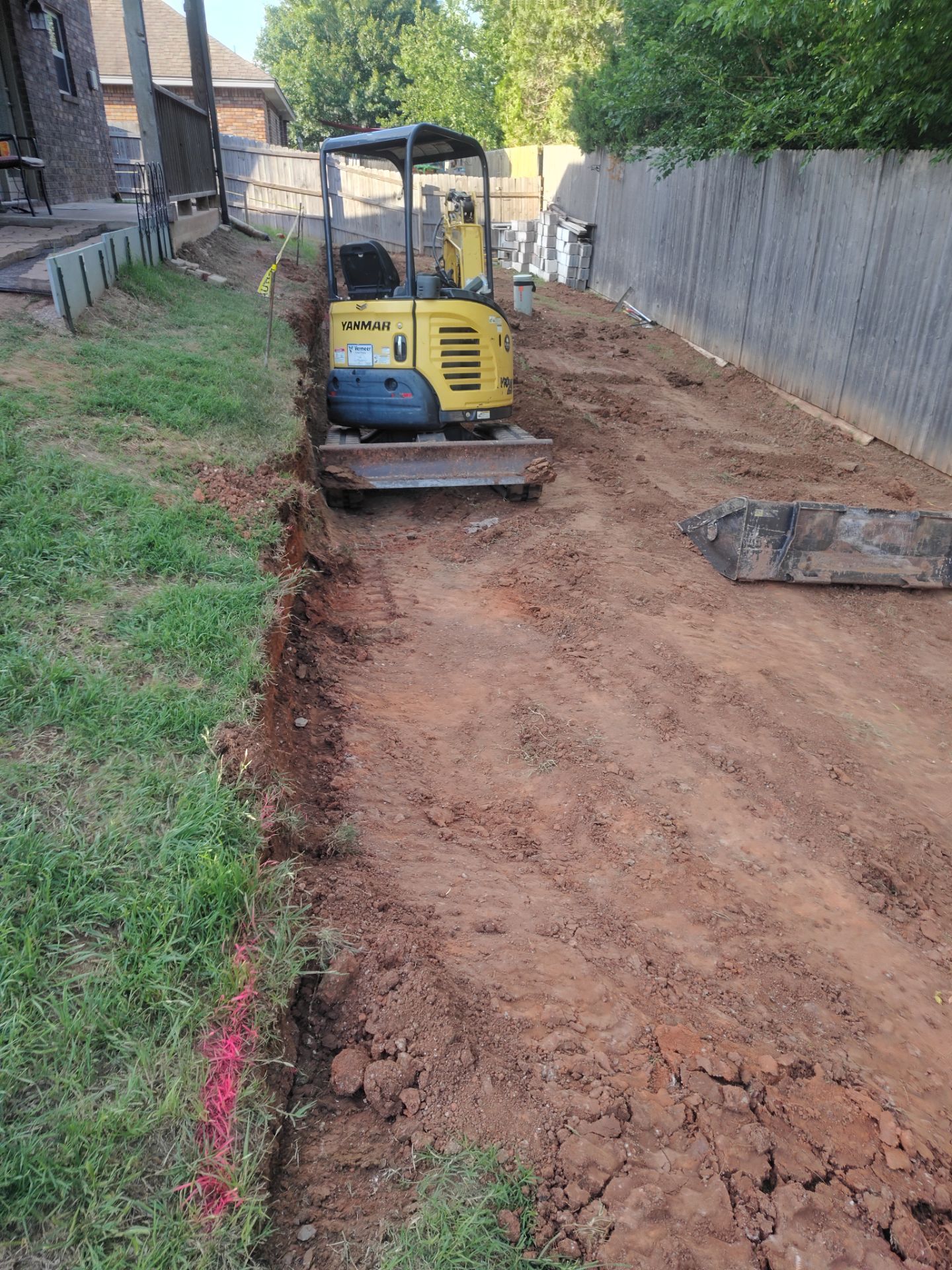 Custom Segmental Block Retaining Wall and Sod Installation in Lawton by Clays Services Inc
