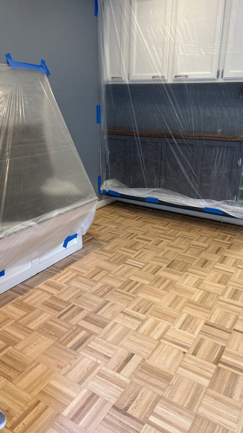 Parquet floor and stair treads by Footprints Floors of Nashville