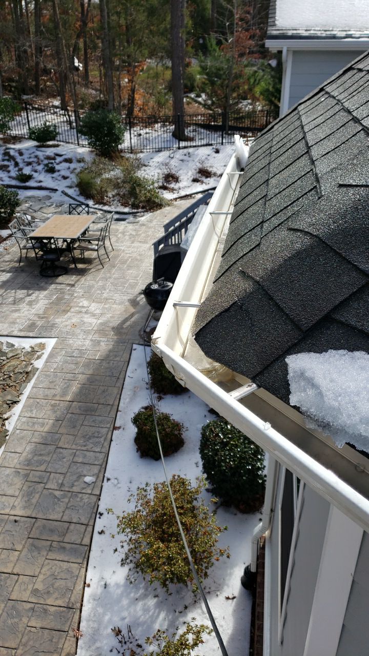 Gutter Cleaning using water by Power Wash Masters LLC