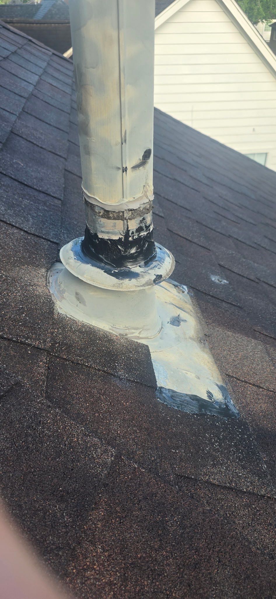 Water Heater Vent Collar Reseal by Black Coast Roofing
