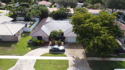 Residential Roofing Installation using 1" Nail strip metal roof