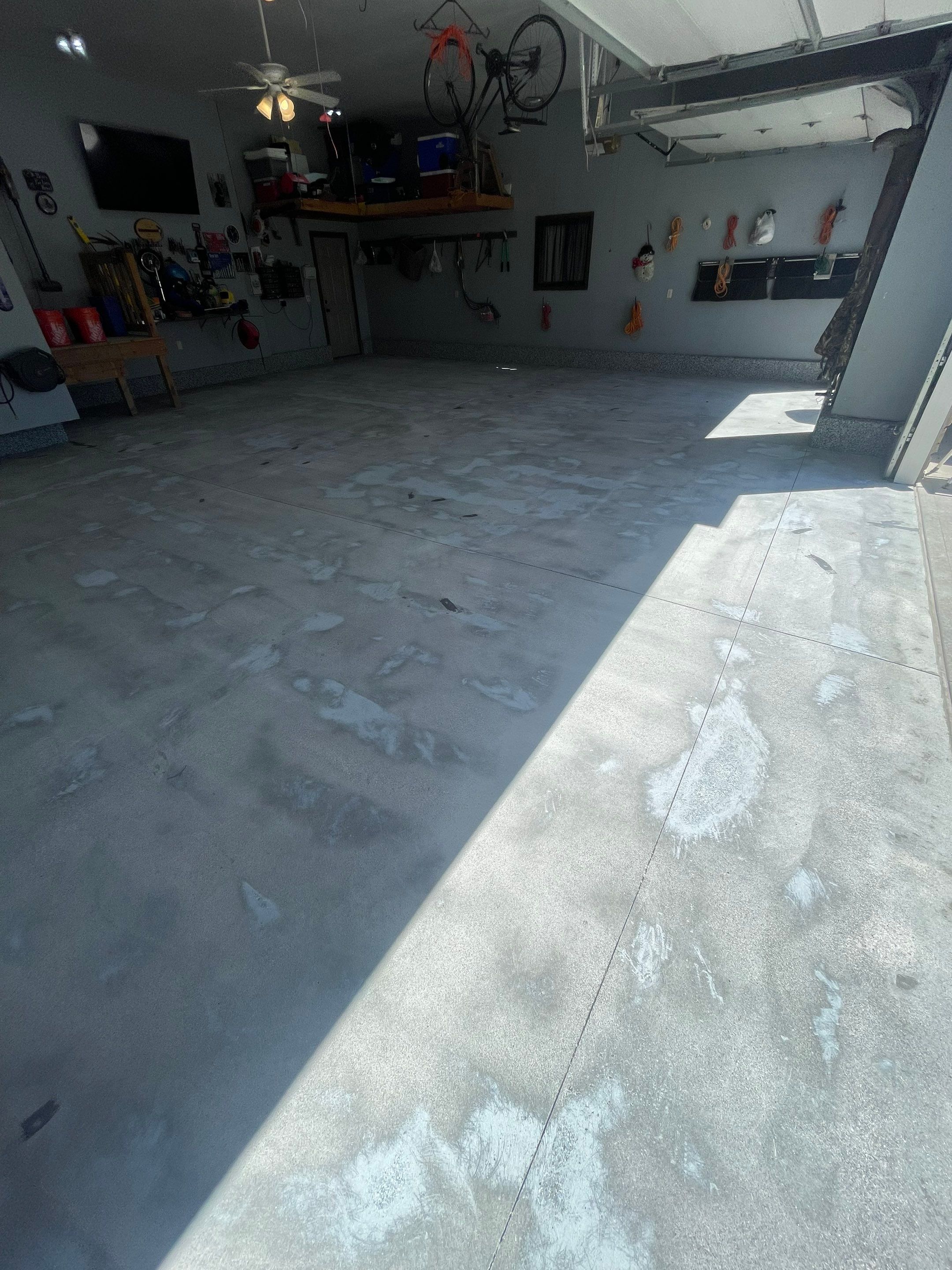 Residential Garage Floor Coating in Sioux Falls by Select Painting, Coatings & Garage Cabinets