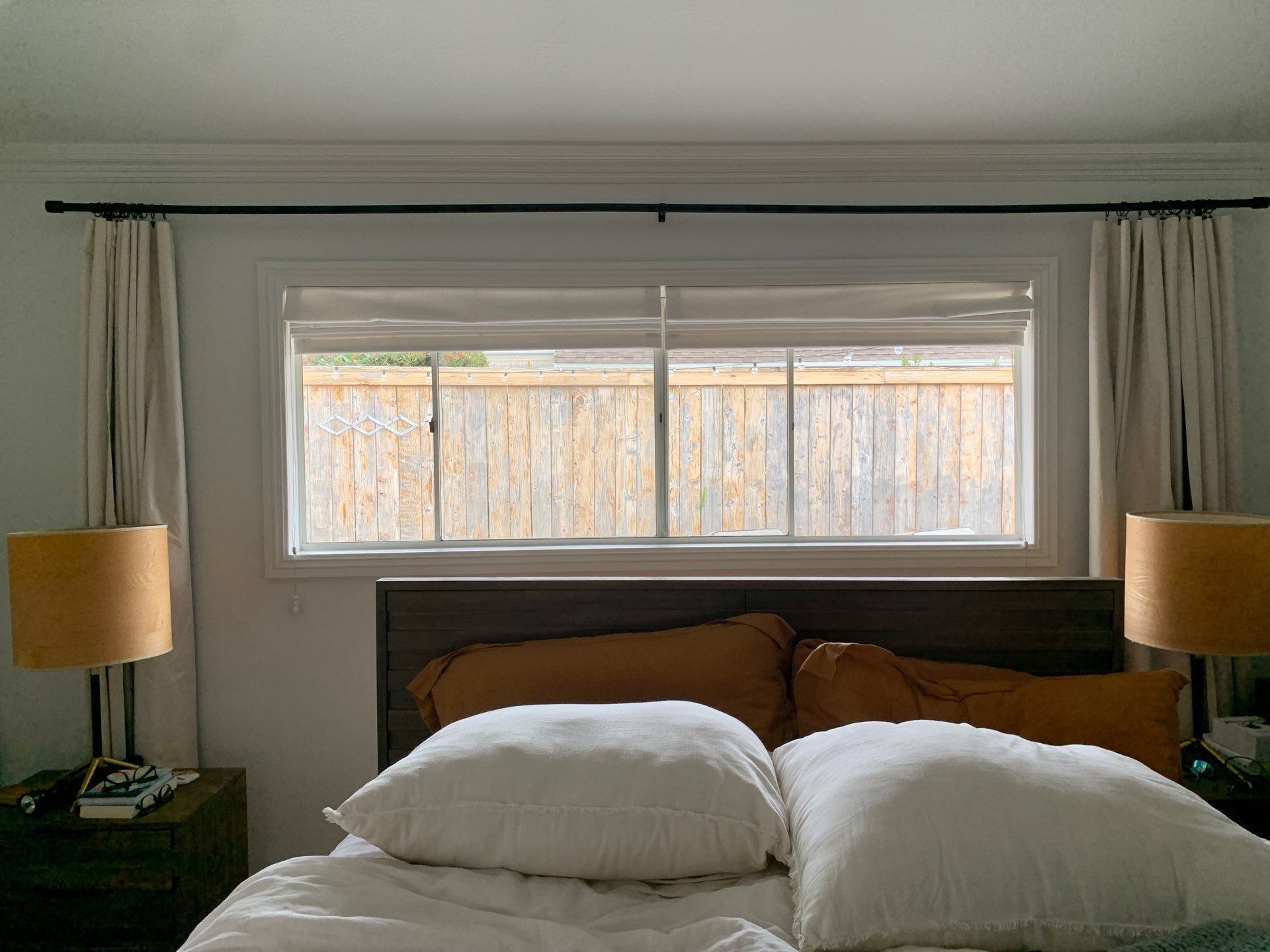 Window Installation using Milgard black vinyl windows by American Window Company