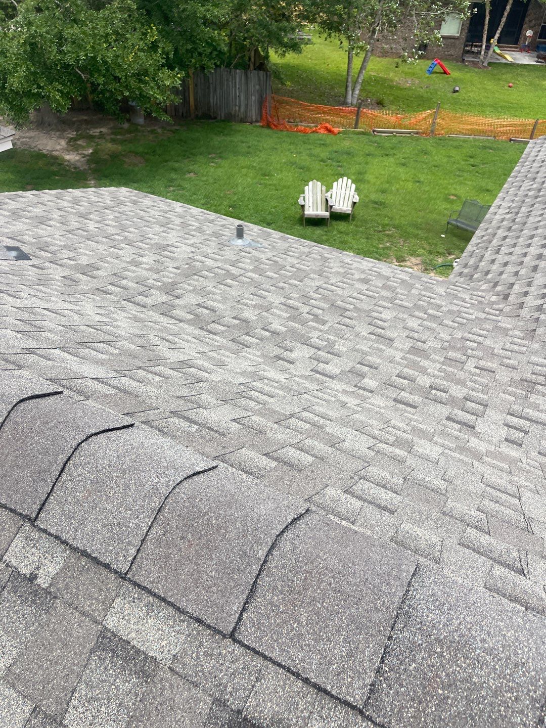 Residential Roofing Installation using Roof Replacement by American Roofing & Construction LLC