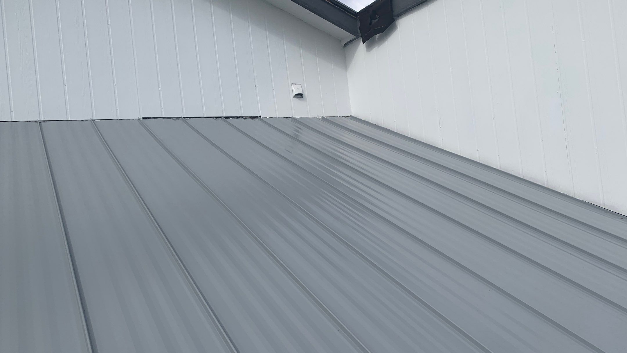 Residential Roofing Installation using 1" Nail strip metal roof by BLUES BROTHERS ROOFING