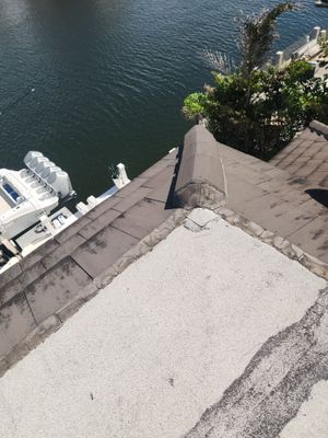 Silicone roof coating and tile tune up in Boca Raton