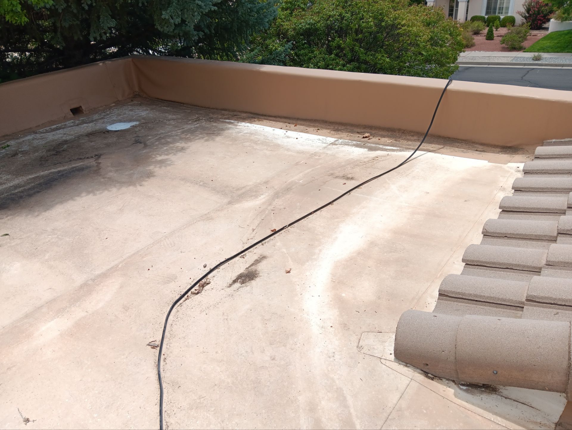 Tile and TPO Roof Maintenance and Gutter Cleaning in Sandia Heights by Doyle Roof Masters Inc