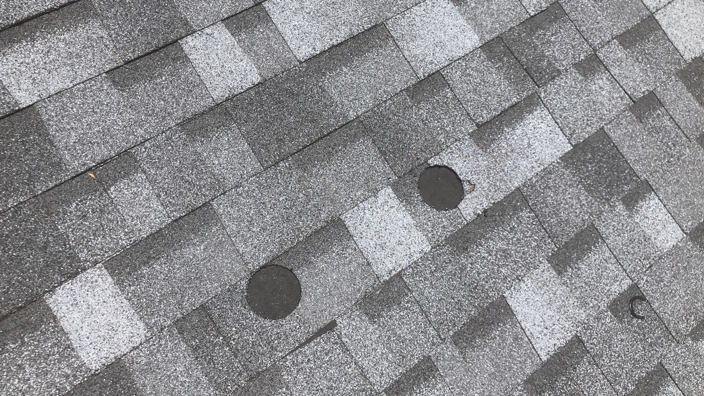 Commercial Roofing Installation using EPDM with white gutters by A Plus Exterior