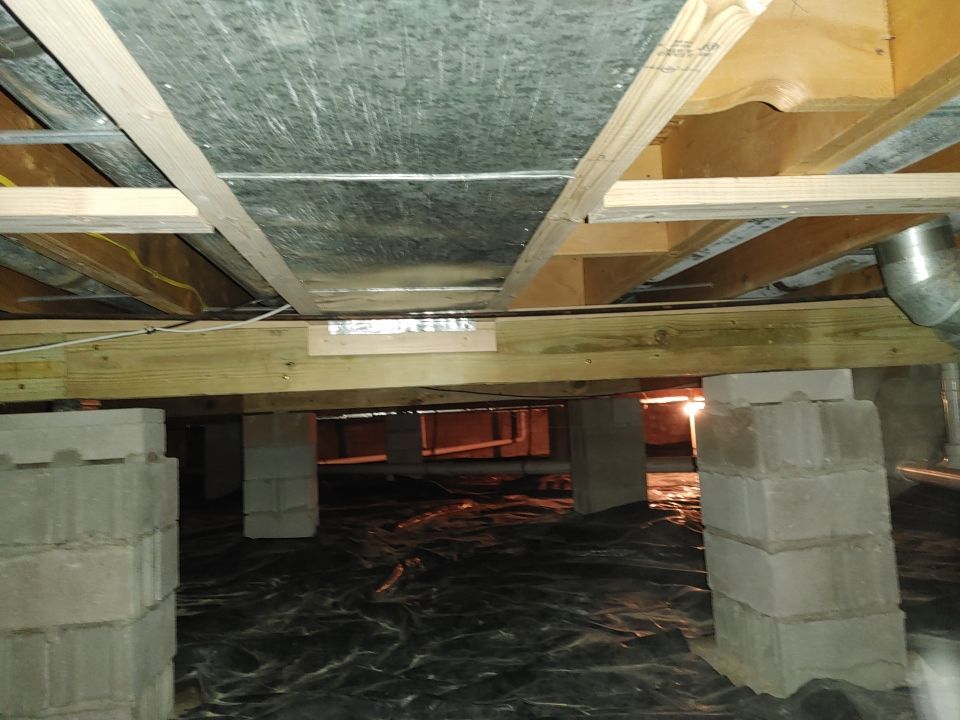 Crawl space encapsulation and Waterproofing using Structural Wood and Steel Reinforcements by Toledo Basement Repair 