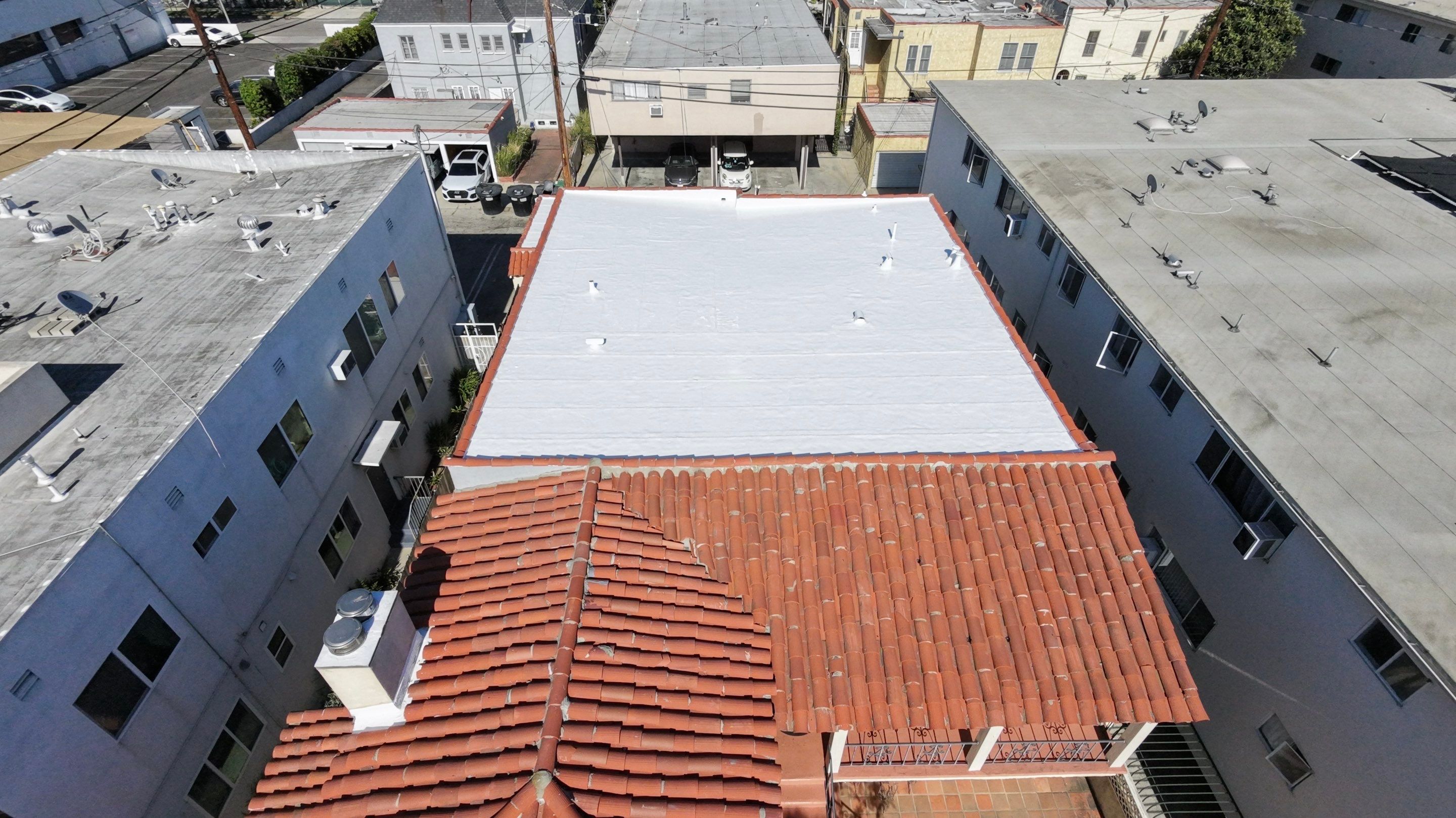 Beverly Hills Flat Roof Coating and Terracotta Tile Reset by Hull Brothers Roofing