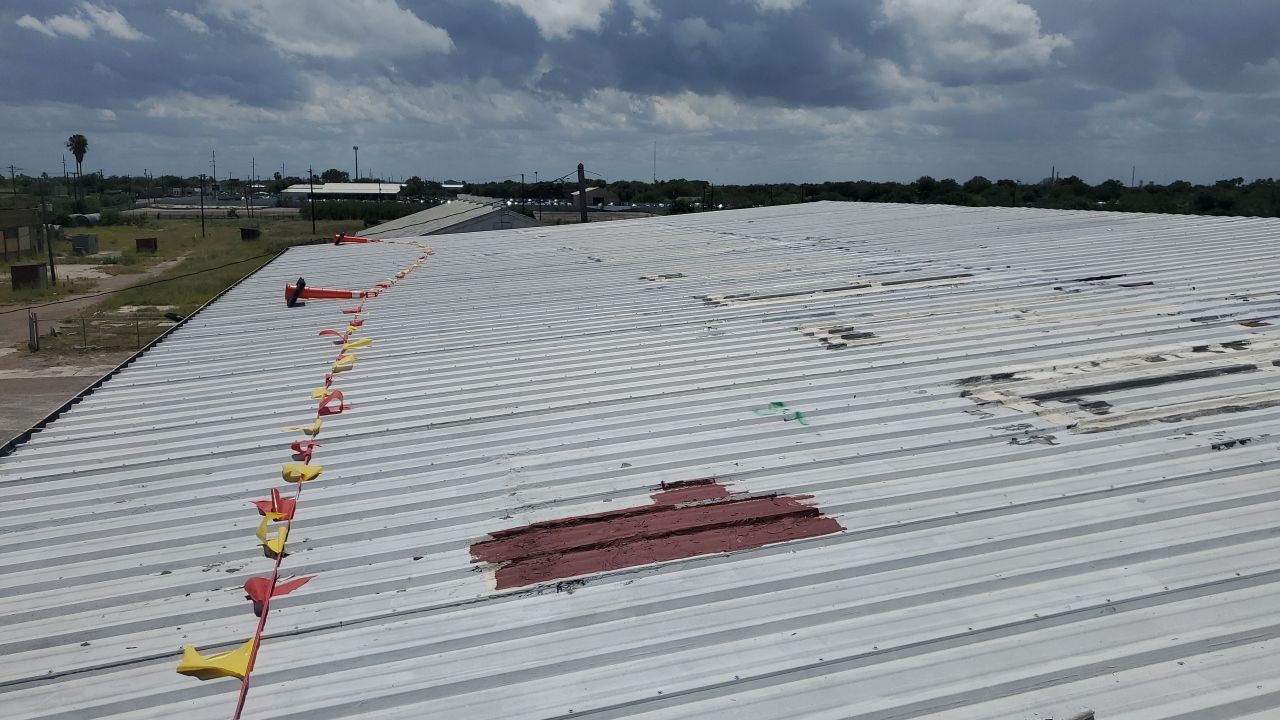 Commercial Roofing Installation using GAF 10 Year Acrylic System by Lighthouse Roofing