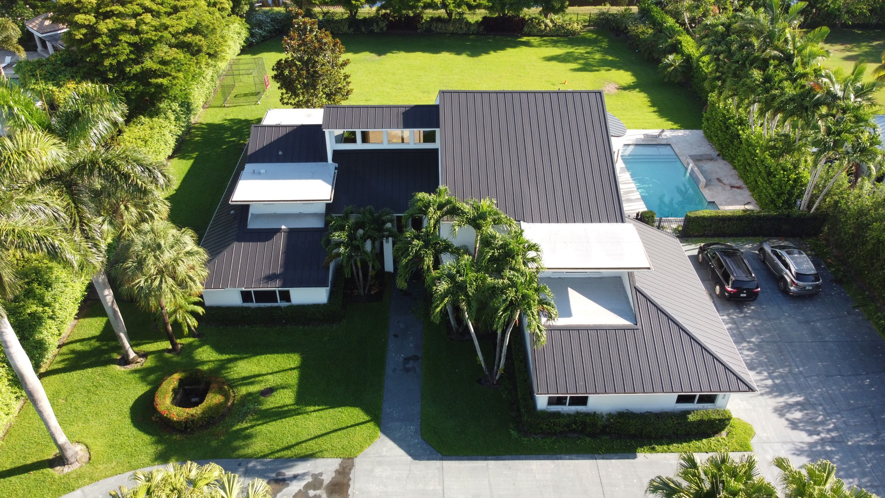 Residential Roofing Installation using 1" Nail strip metal roof by BLUES BROTHERS CONSTRUCTION CORP
