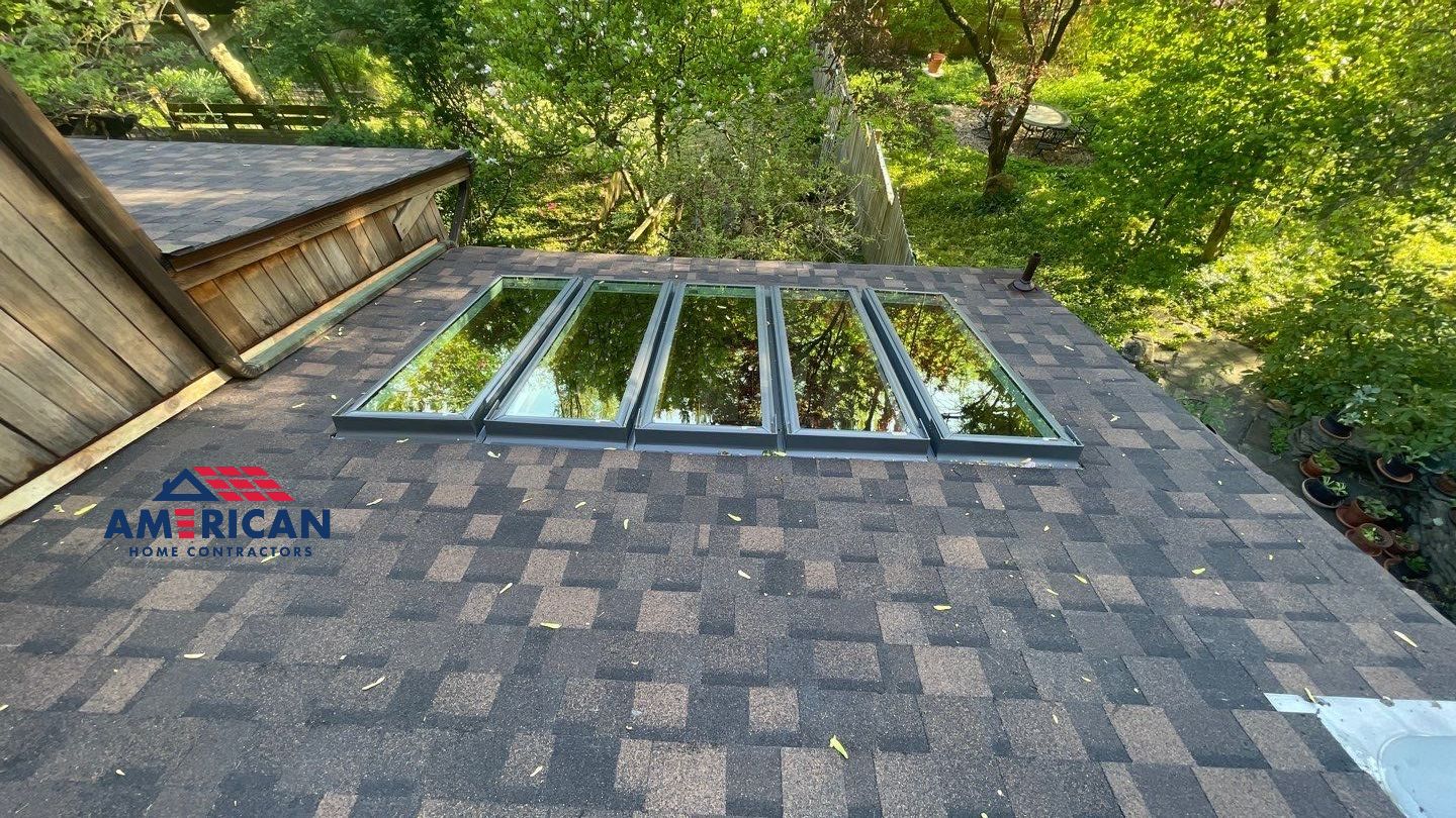 Roof Replacement w/ Skylights in Baltimore, MD (IKO Dynasty) by American Home Contractors