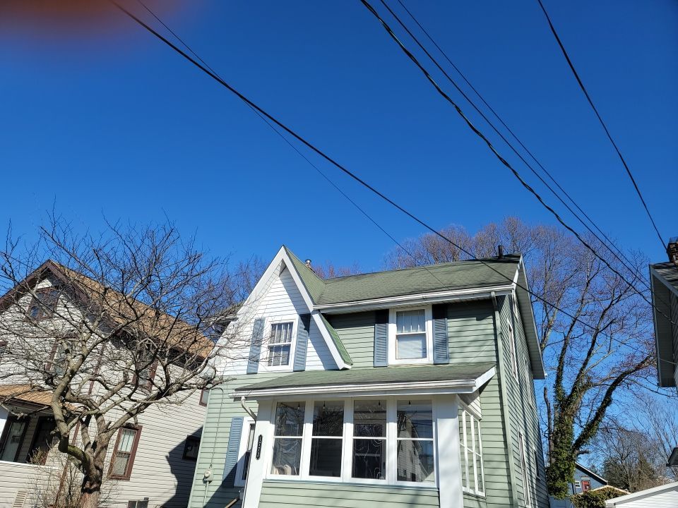 ATLAS PINNACLE COLOR: COASTAL GRANITE DRIP EDGE: WHITE by Eagle Eye Roofing