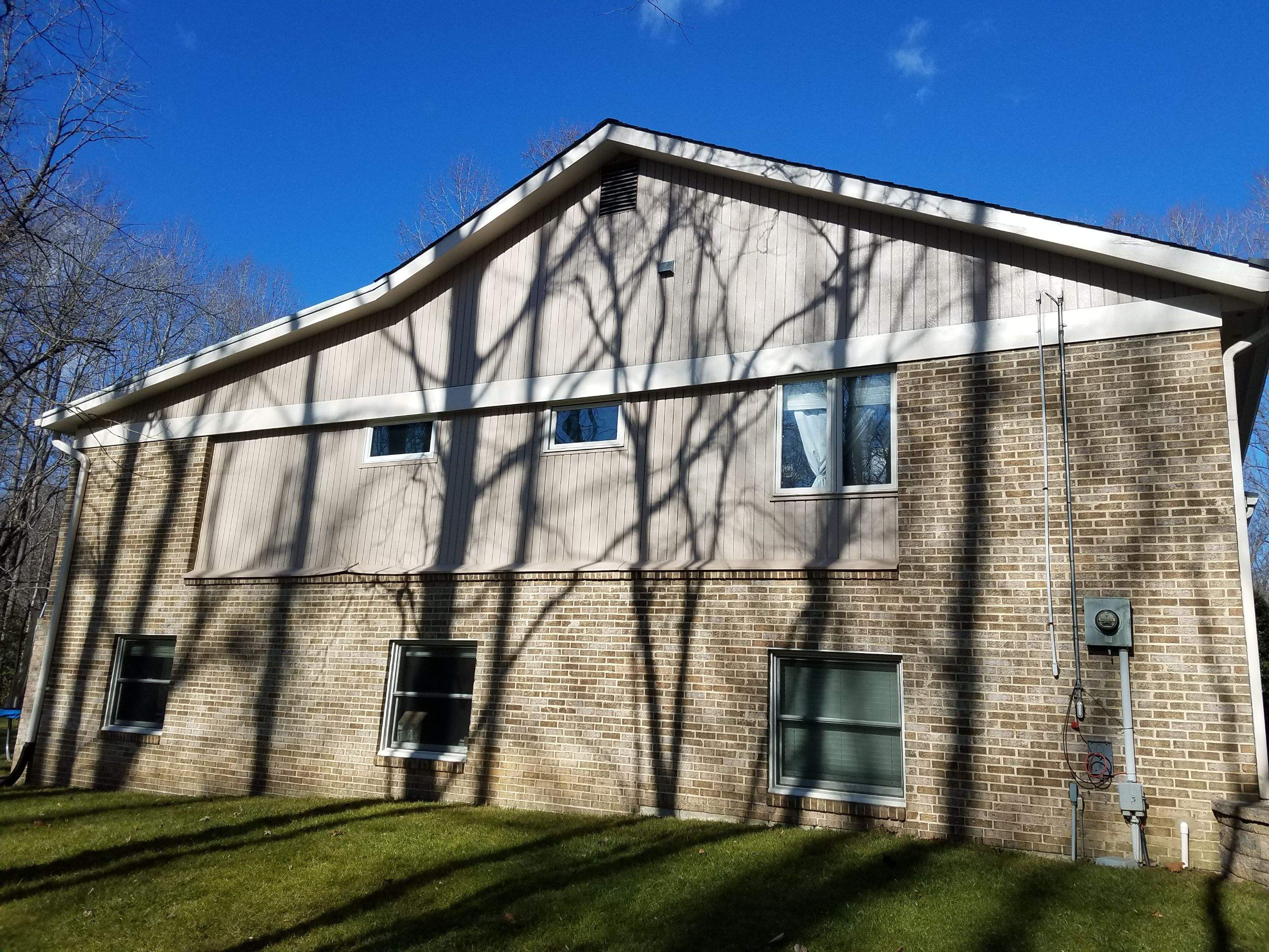 Roof, Siding, Door, and gutter replacement by American Home Contractors