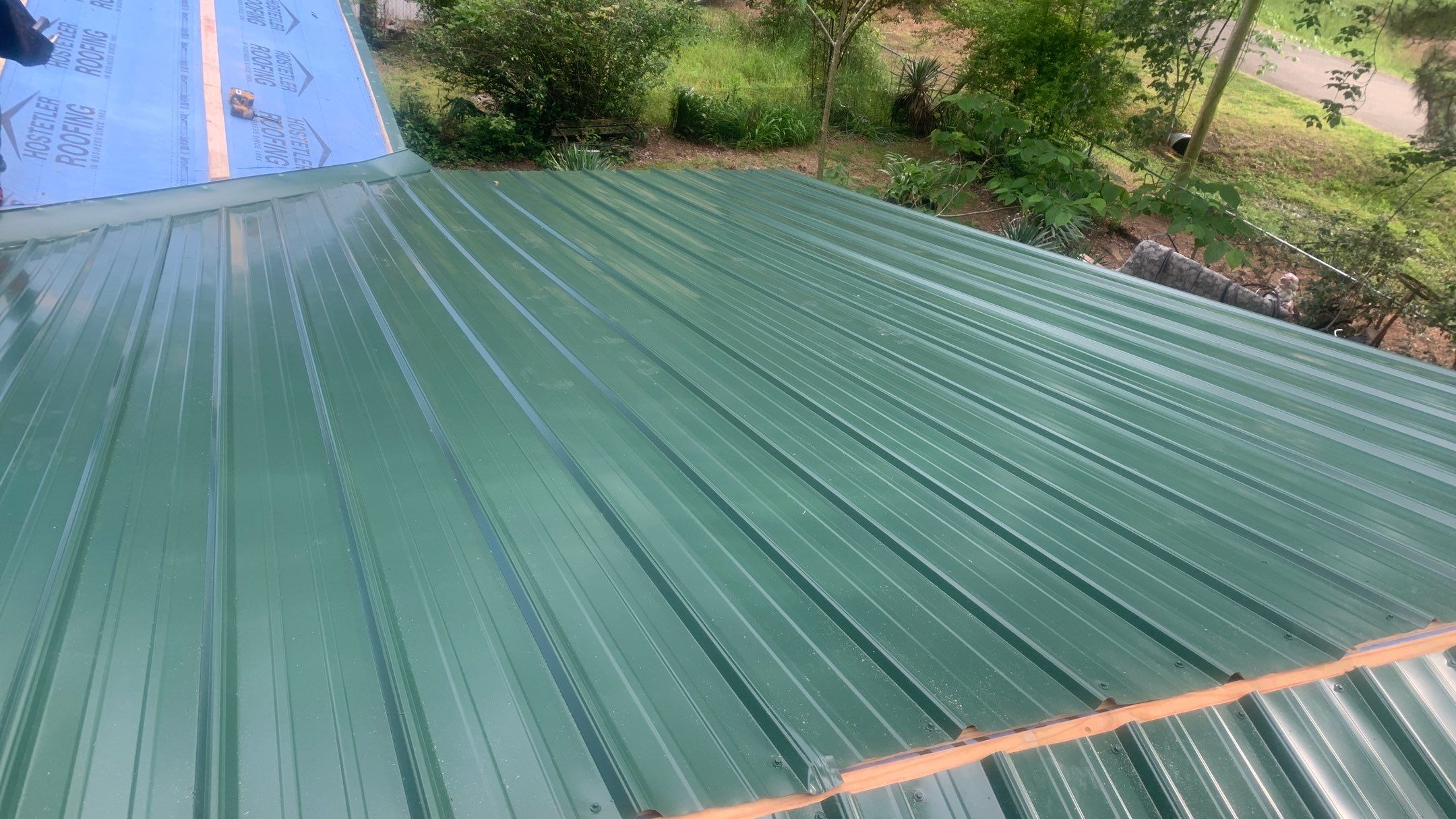 Residential Shingle Reroof using 29 gauge metal by Hostetler Roofing