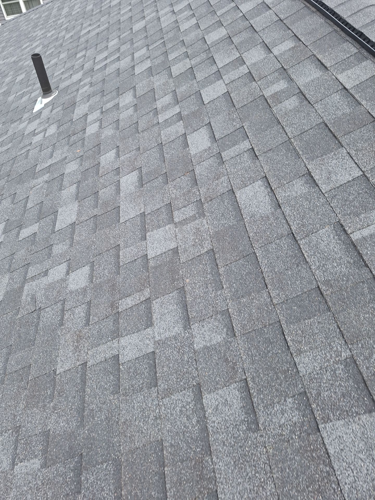 Estate Gray Shingles by Reimagine Roofing