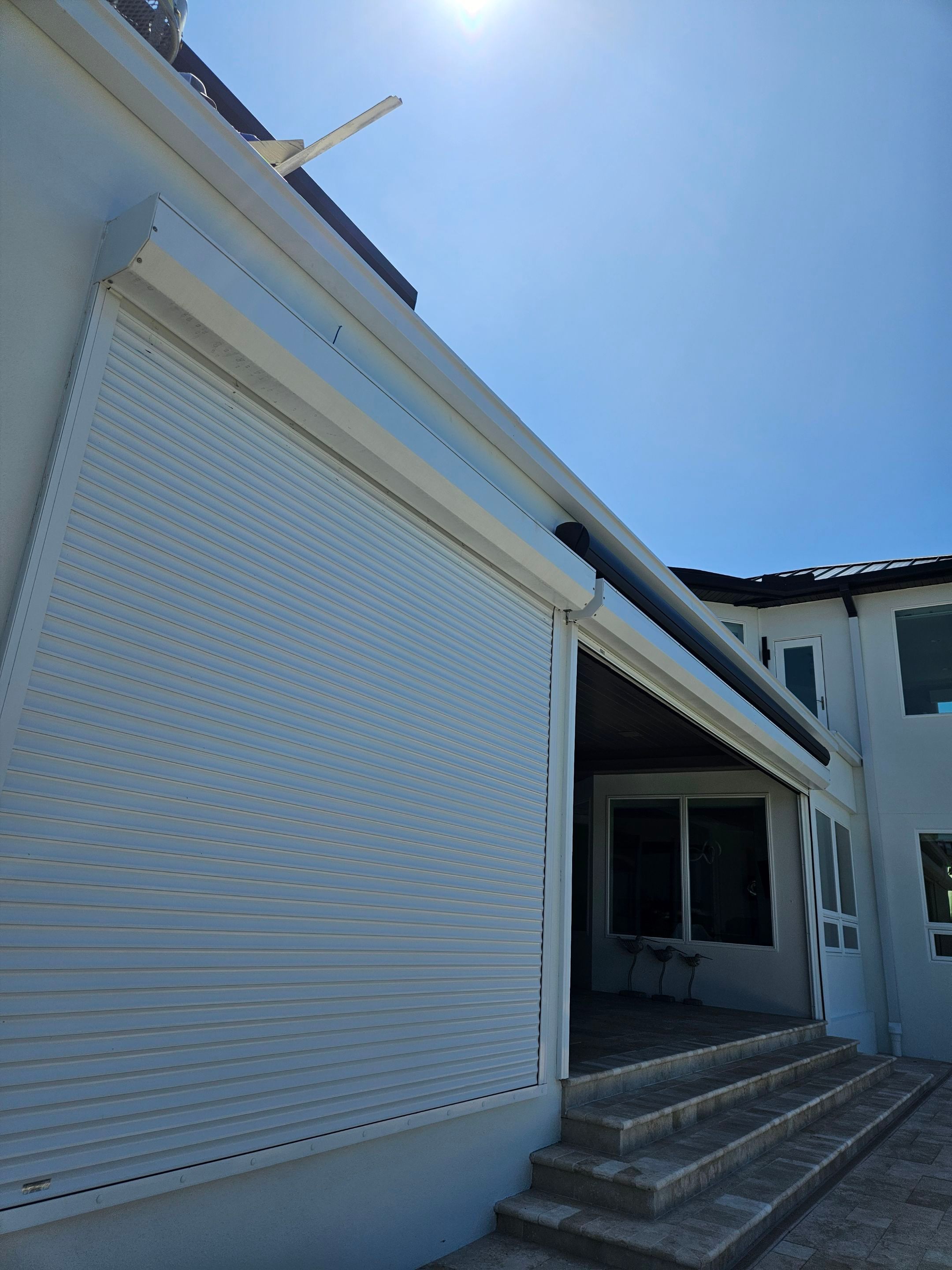 Soffit and Fascia Installation and black seamless gutters in Sarasota FL by Gutter Professors