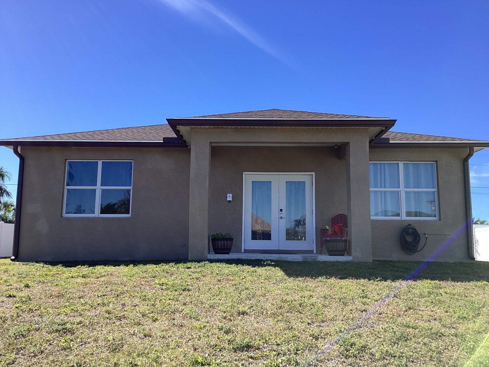Royal Brown Seamless Gutters in Cape Coral FL by Gutter Professors