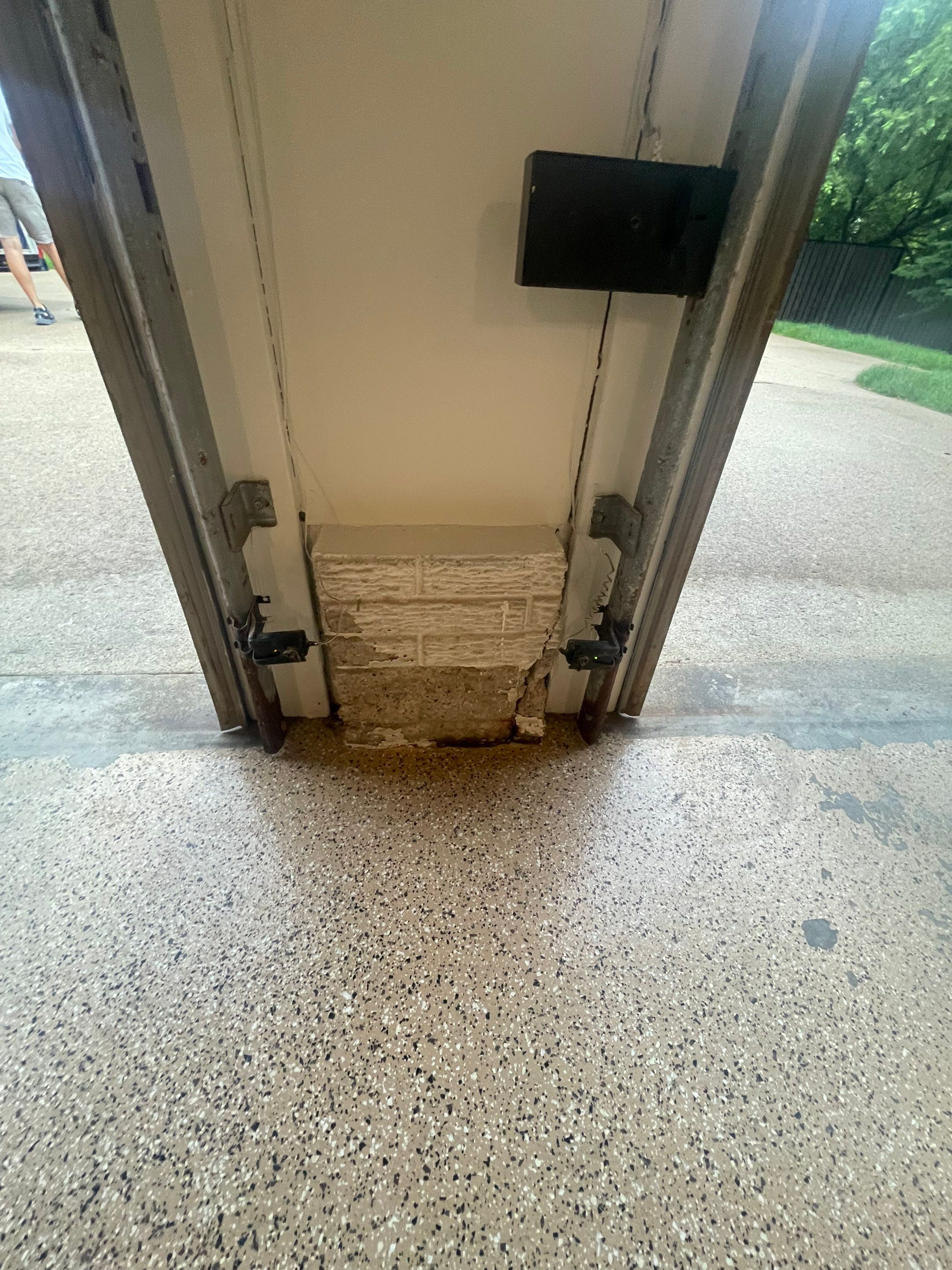 Gray Speckled Epoxy Garage Floor Coating in Sioux Falls by Select Painting, Coatings & Garage Cabinets