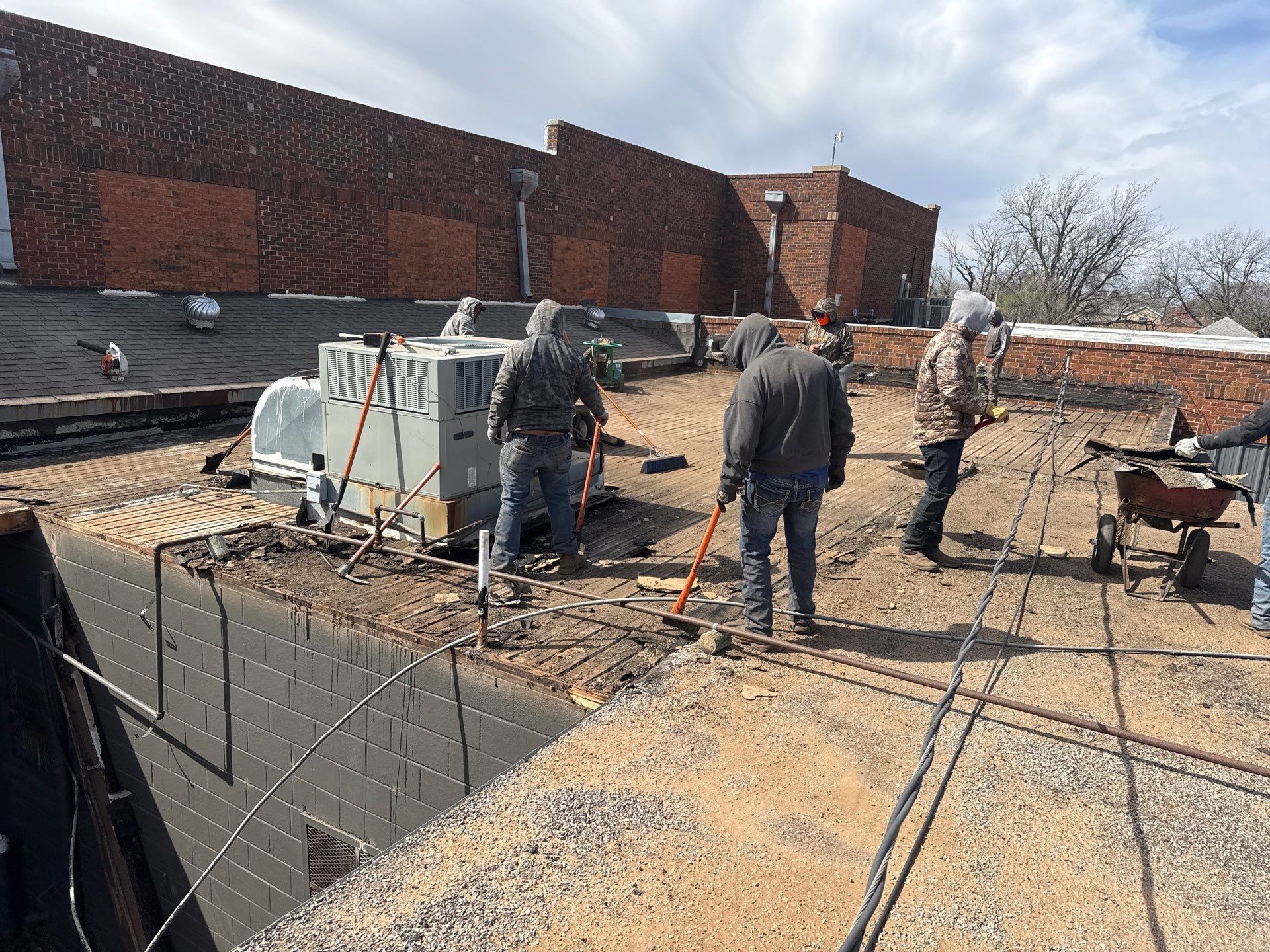 Hollis High School Comprehensive TPO Roof Replacement and Restoration by Secondary Rhodes