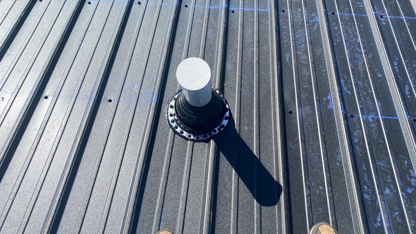 Residential Roofing Installation using Performance Panel Metal - Frost Black by RoofX 