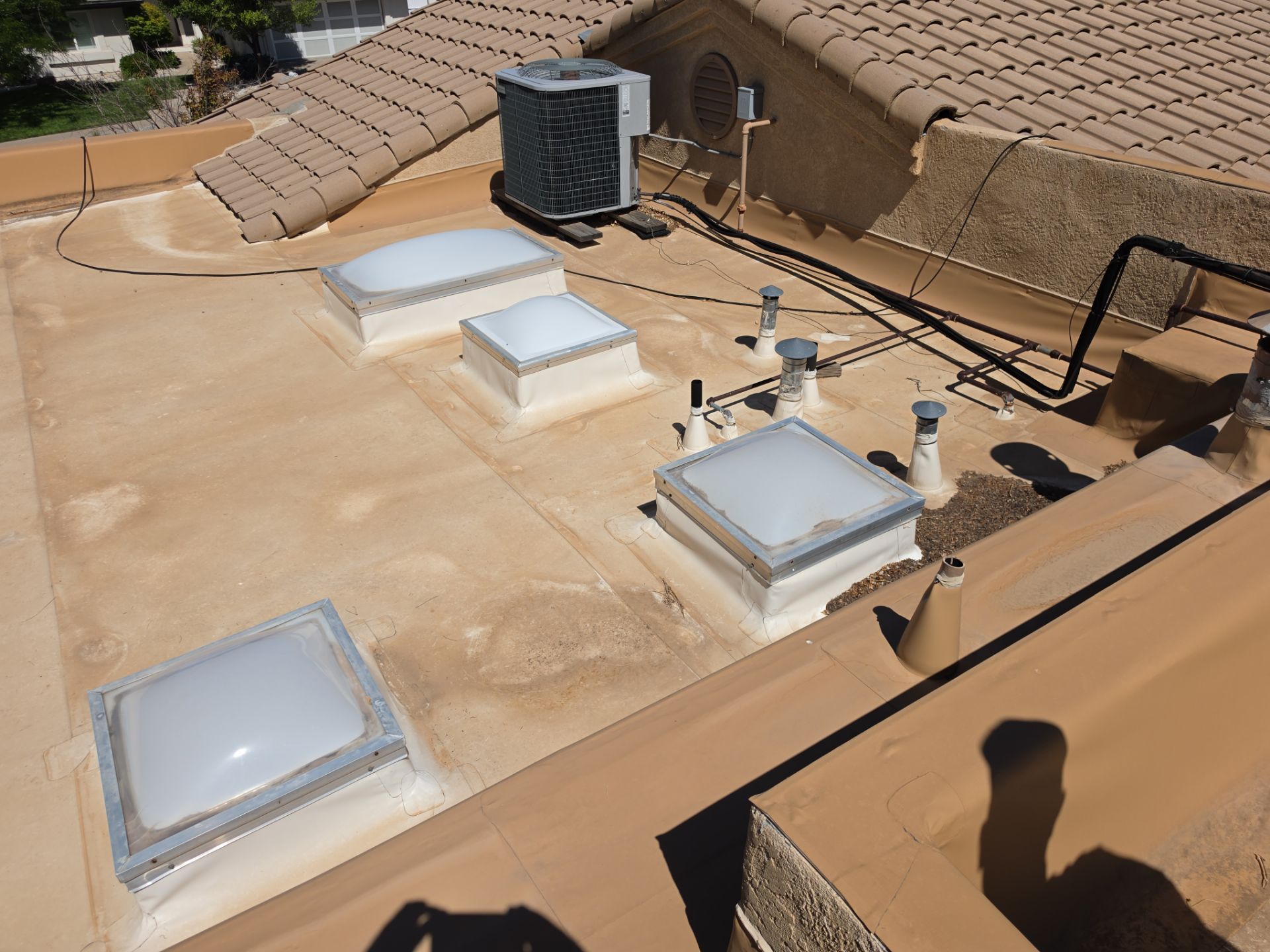 Tile and TPO Roof Maintenance and Gutter Cleaning in Sandia Heights by Doyle Roof Masters Inc