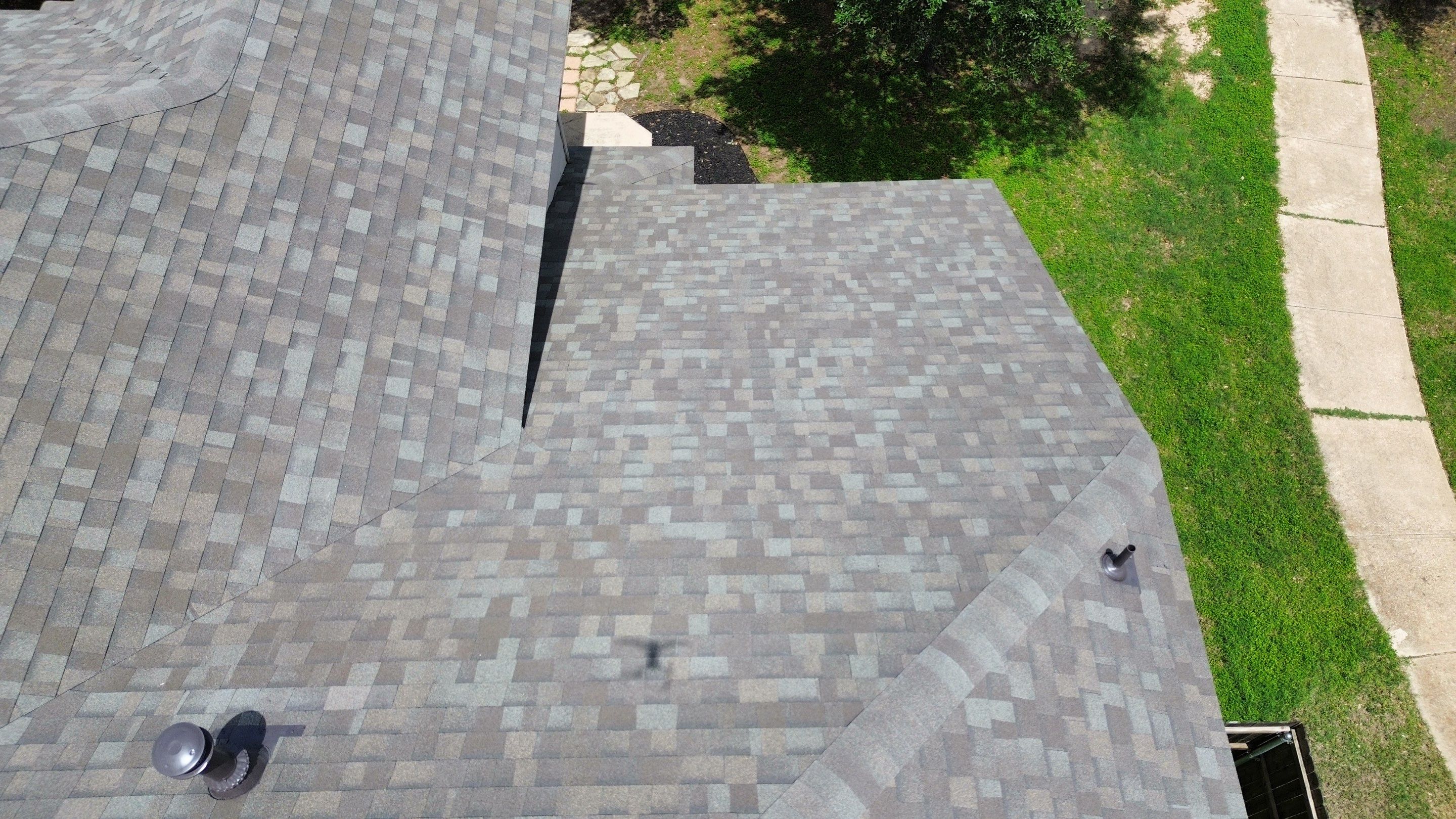 Roof Replacement & Chimney Cricket Upgrade in Cedar Park, TX by Kstylez Roofing & Construction