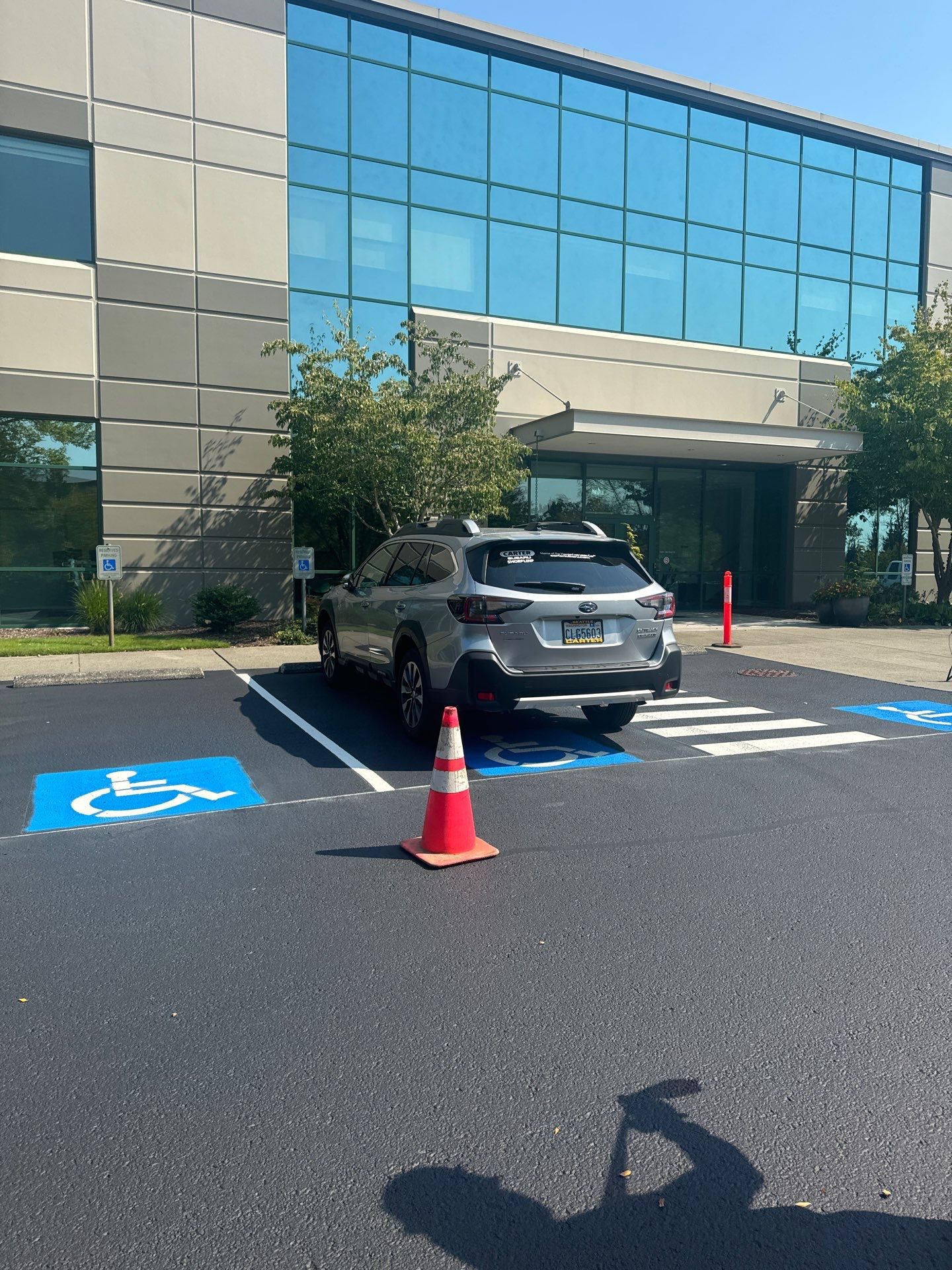 Kidder Matthews | Parking Lot Sealcoating & Striping with Concrete Curb & Patch Repairs  by Jireh Asphalt & Concrete Inc 