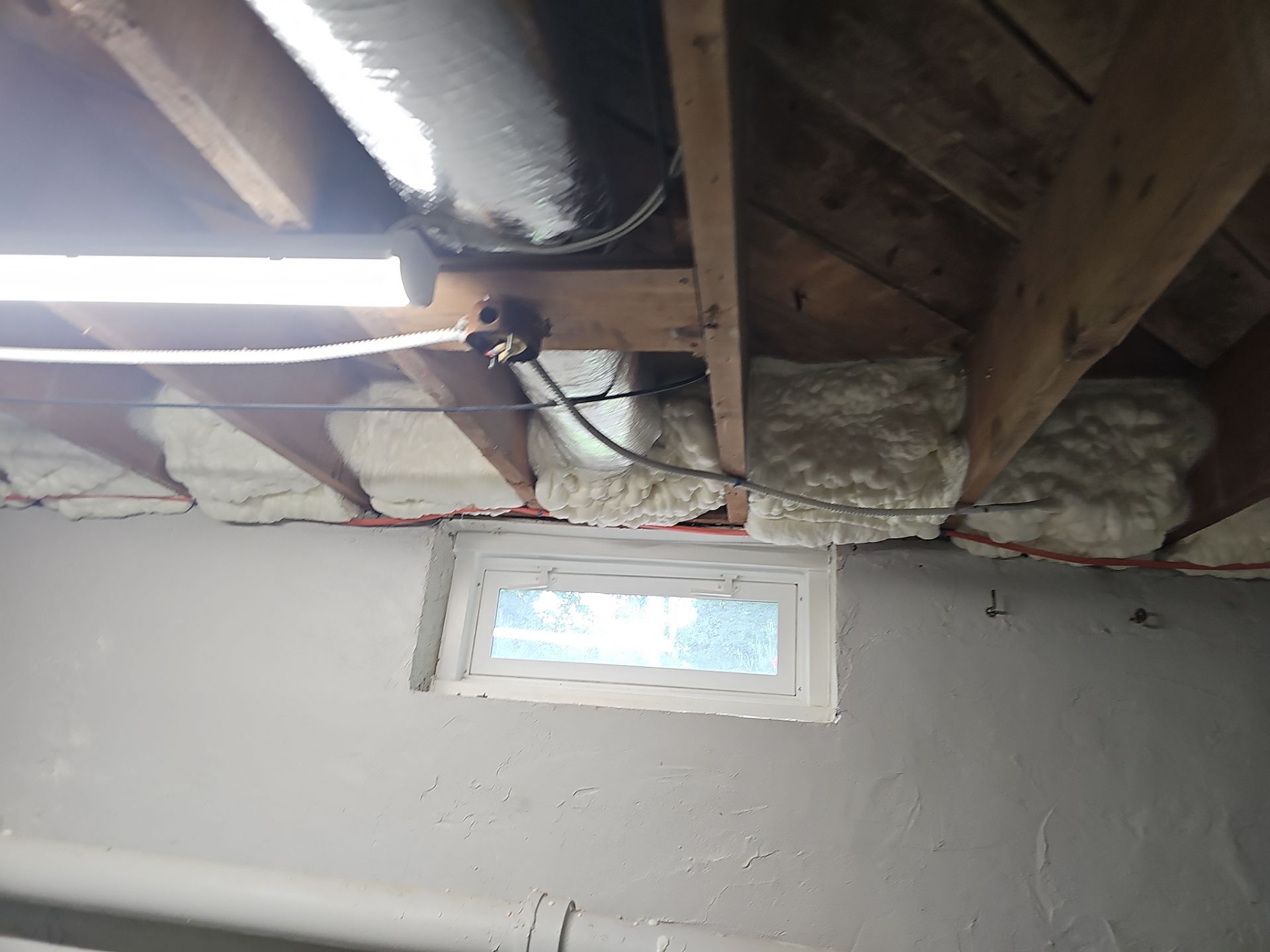 Attic Insulation using open cell spray foam by NYS Foam & Energy