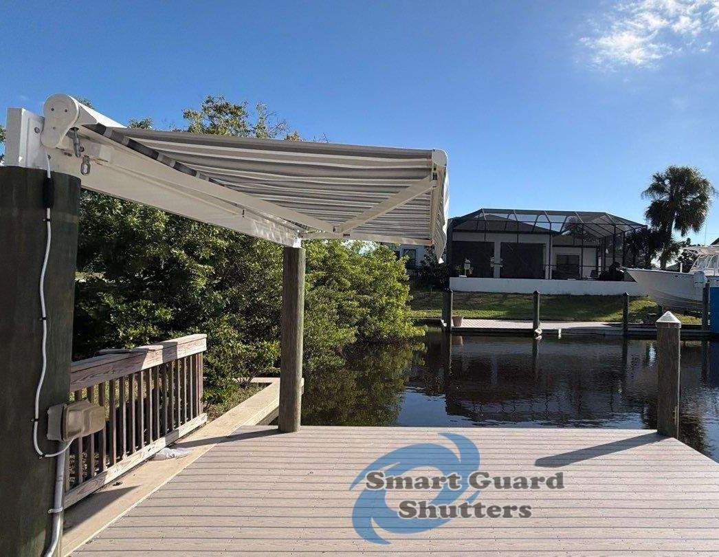 Retractable Awning in Sunbrella Marco Blue Grey by Smart Guard Shutters