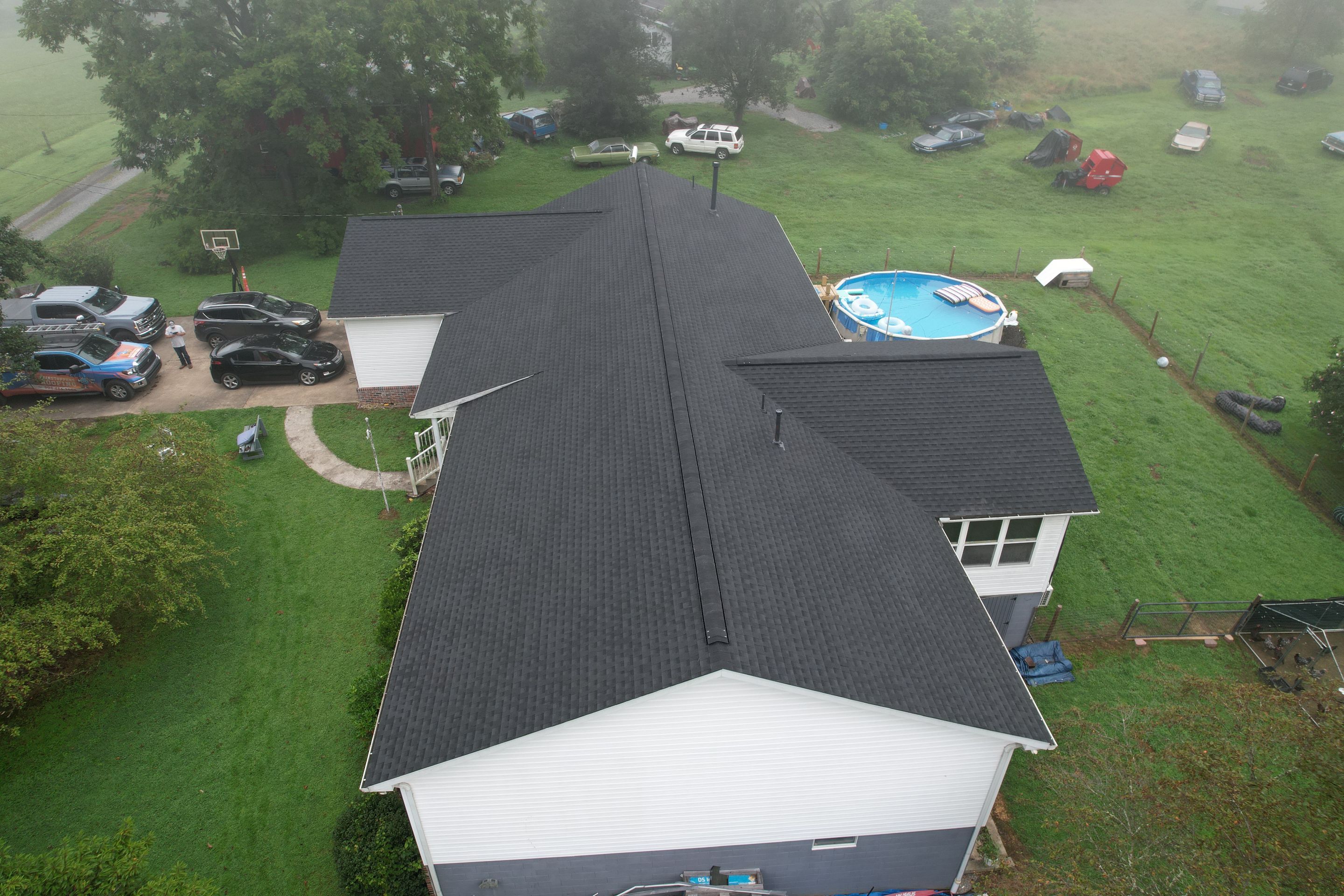Residential Roofing Installation using GAF Timberline HDZ Charcoal by Rainstoppers Roofing
