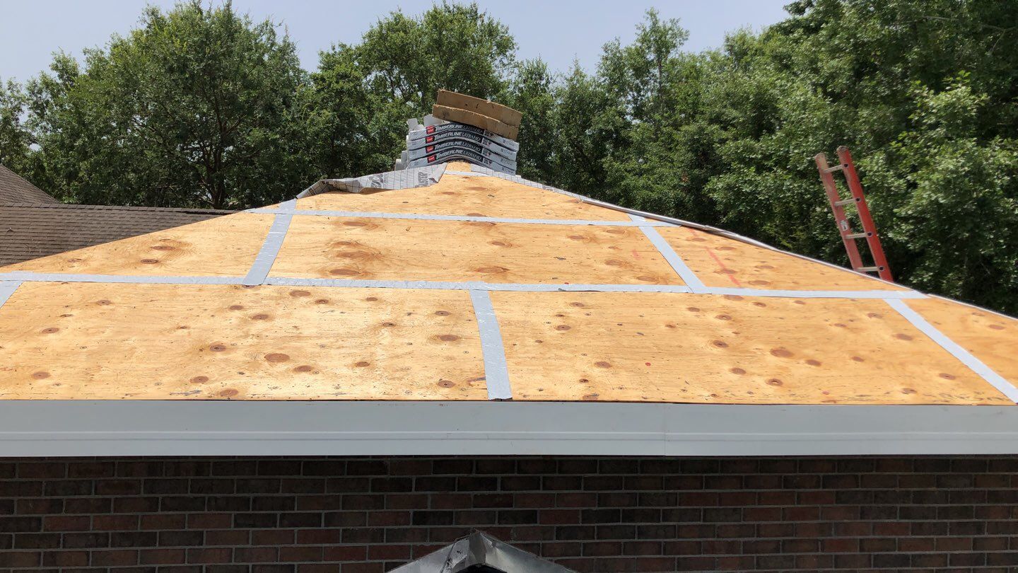 Residential Roofing Installation using Roof Replacement by American Roofing & Construction LLC