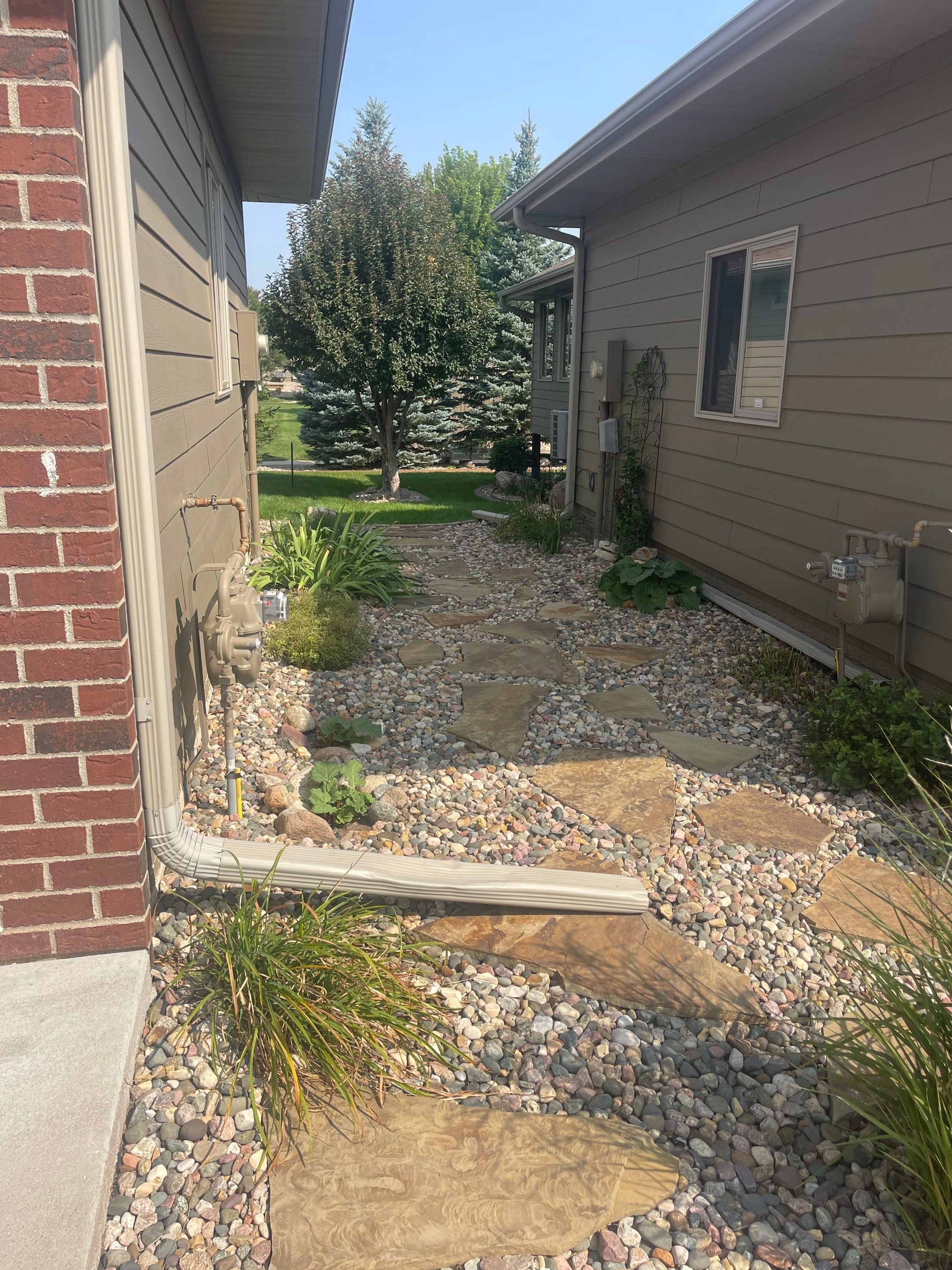 Residential Exterior Siding and Trim Painting in Sioux Falls by Select Painting, Coatings & Garage Cabinets