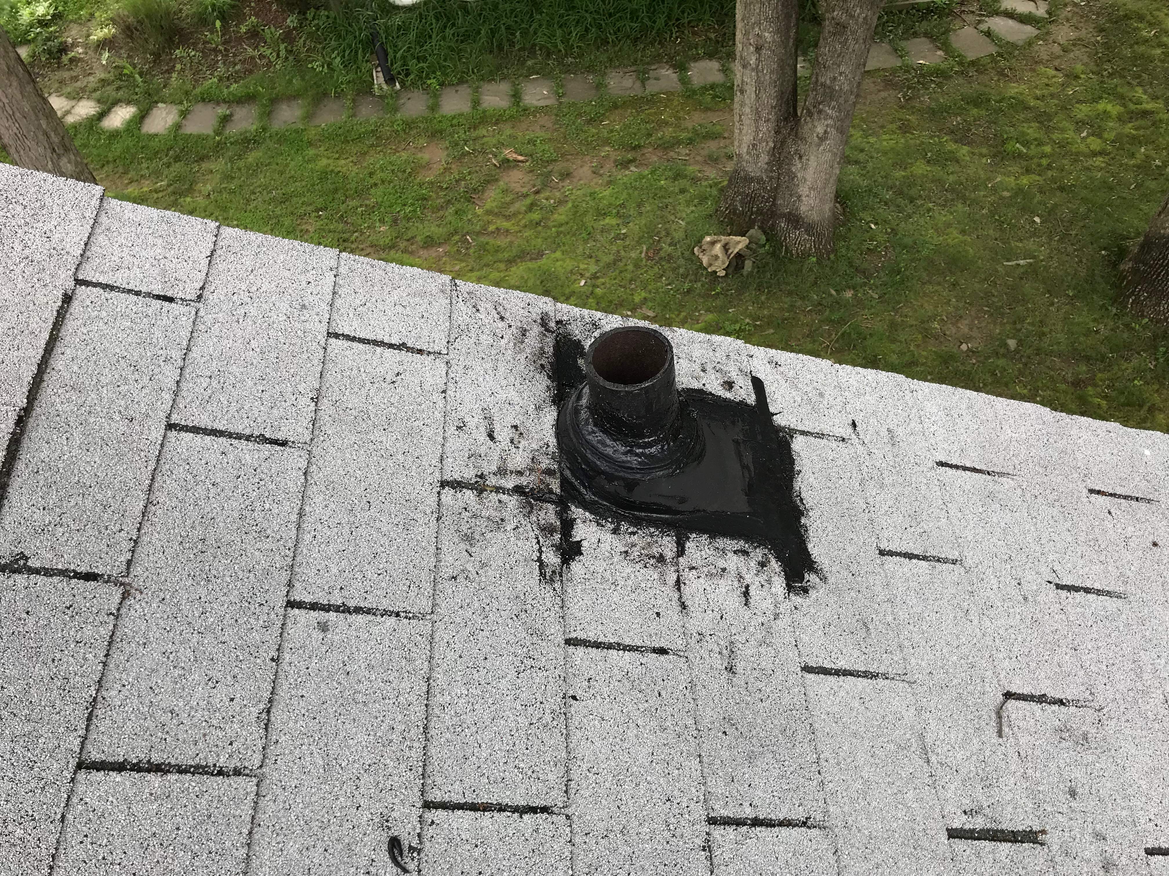 Residential Roofing Installation using Charcoal Black by Alpha Design Services